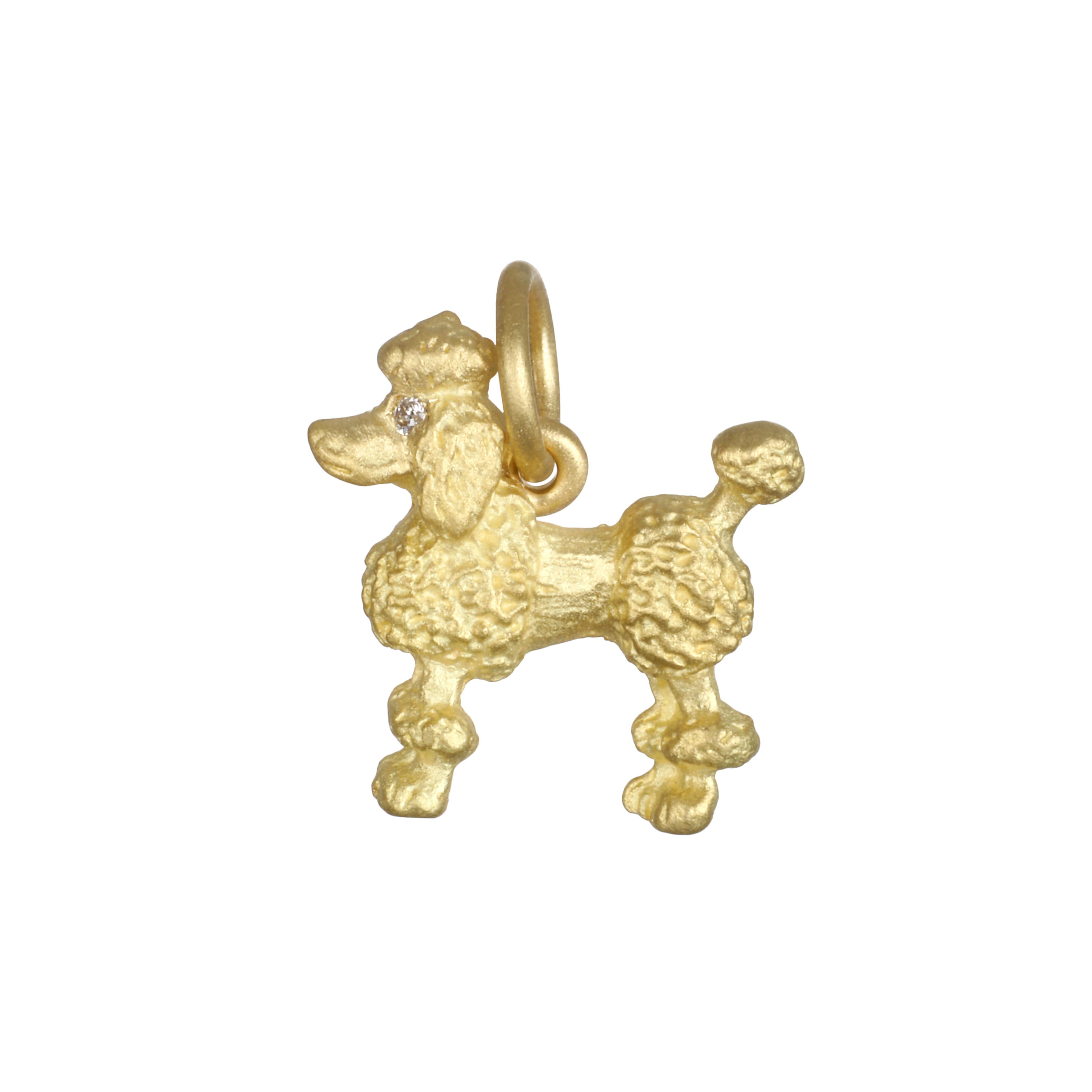 Poodle lovers - Show your love for their intelligent, reliable and affectionate nature. Faye Kim's Poodle charm in 18k gold sparkles with a diamond eye and pom-poms.

Charm Length x Width:  .5
