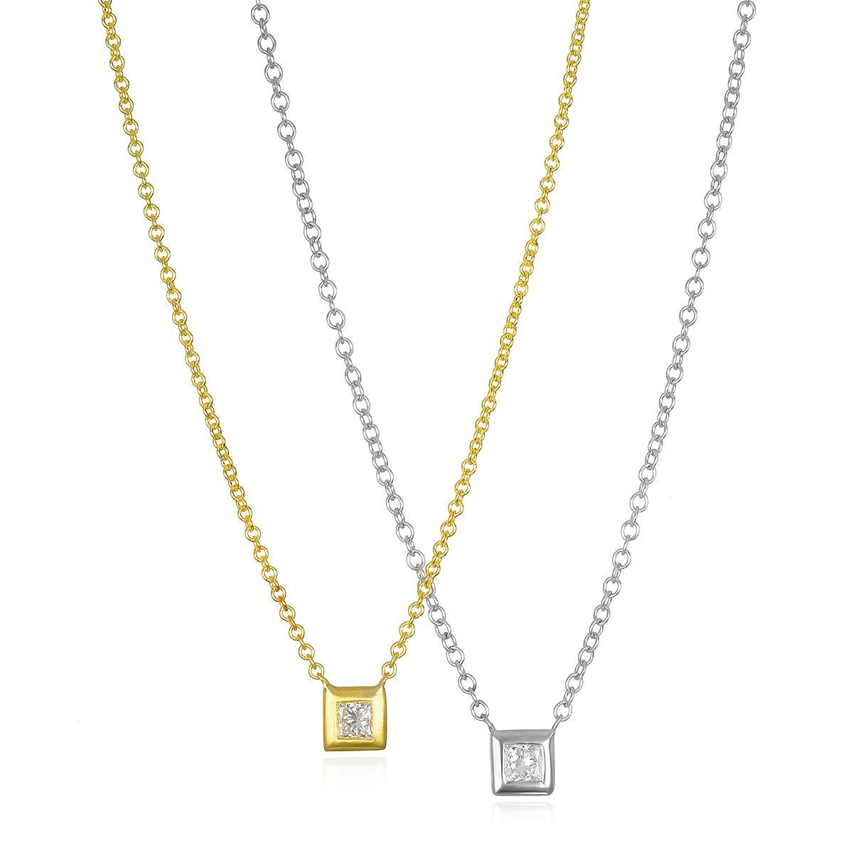When you want just a bit of sparkle and pop, Faye Kim's Princess-cut diamond station necklace is the perfect solution. Bezel set in Faye's signature 18k green gold with a matte finish.
Wear alone or layer with longer, larger necklaces.

Diamond .11