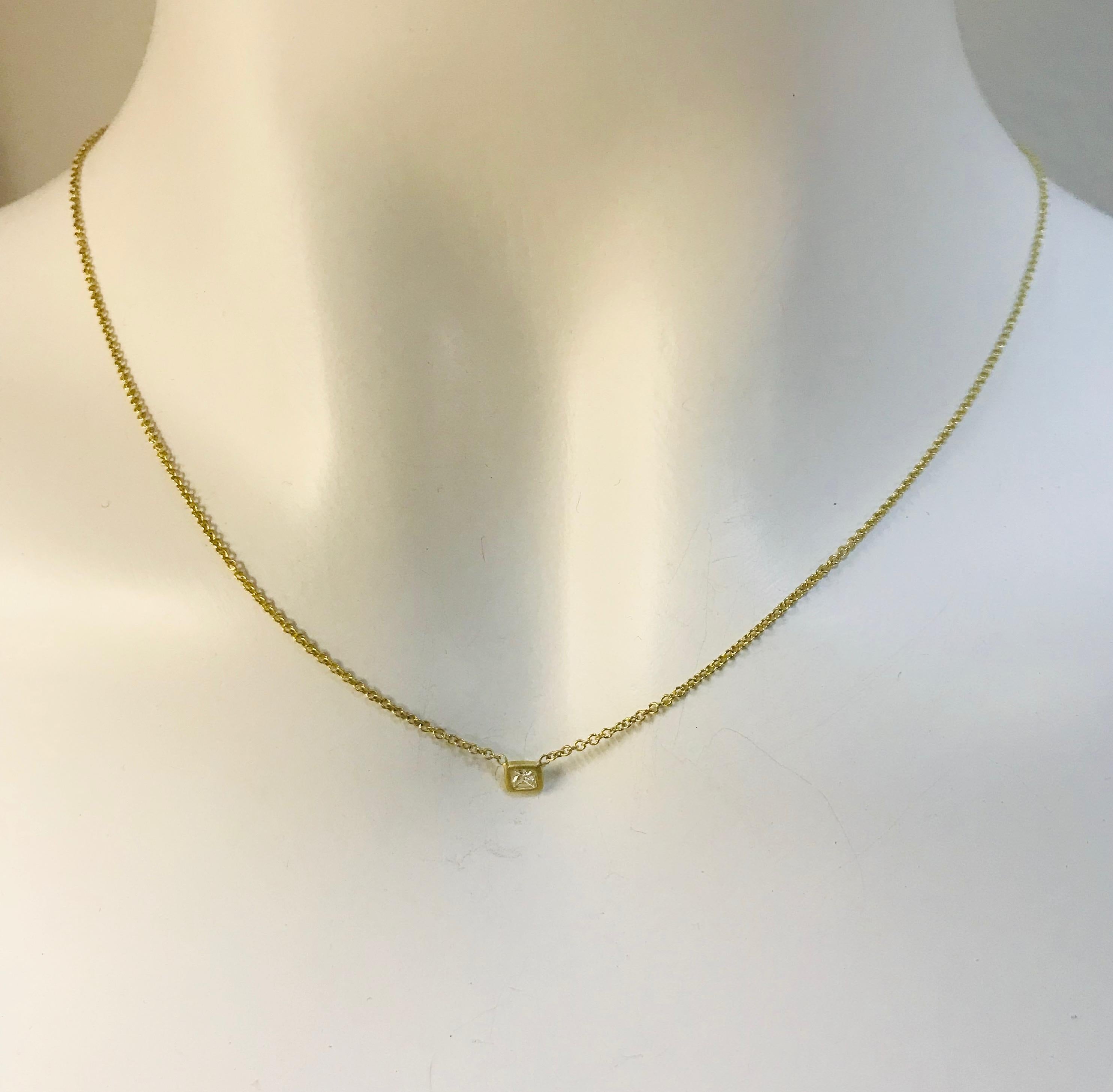 Faye Kim 18k Gold Princess Cut Diamond Solitaire Necklace

It's the perfect necklace for a special birthday, anniversary, graduation or just about any memorable event.   Set in 18k gold,  the matte finish makes the diamond really sparkle.  Delicate