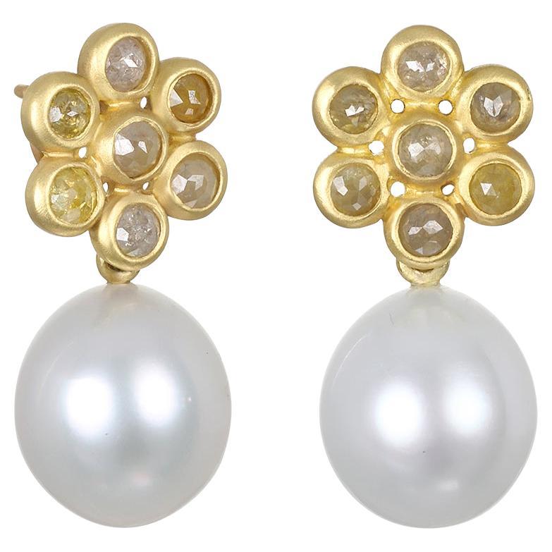 Faye Kim's signature 18 Karat Gold Raw Diamond Daisy Earrings with Golden South Sea Pearl Drops comprise two earrings in one. The Golden South Sea Pearl Drops are detachable, allowing the diamond daisy stud earrings to be worn on their worn as