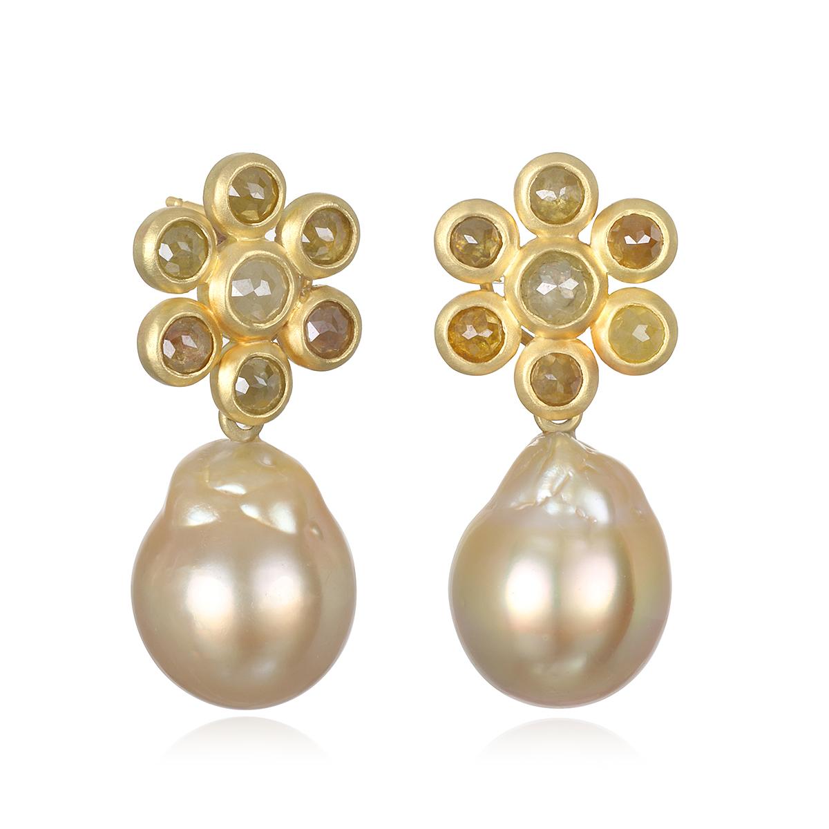 Faye Kim's signature 18 Karat Gold Raw Diamond Daisy and White South Sea Pearl Drops comprise two earrings in one. The White South Sea Pearl Drops are detachable, allowing the daisy diamond earrings to be worn on their worn as diamond studs. 