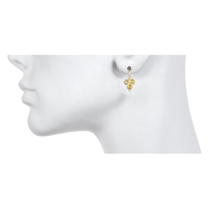 Triple Bezel Raw Diamond Drop Earrings With Granulation Hinged Ear Wires.
Each pair is handcrafted and unique. The natural subtle shades of raw diamonds are complemented by the warm glow of matte-finished 18k gold.

Milky Diamond
Diamonds 1.65 cts