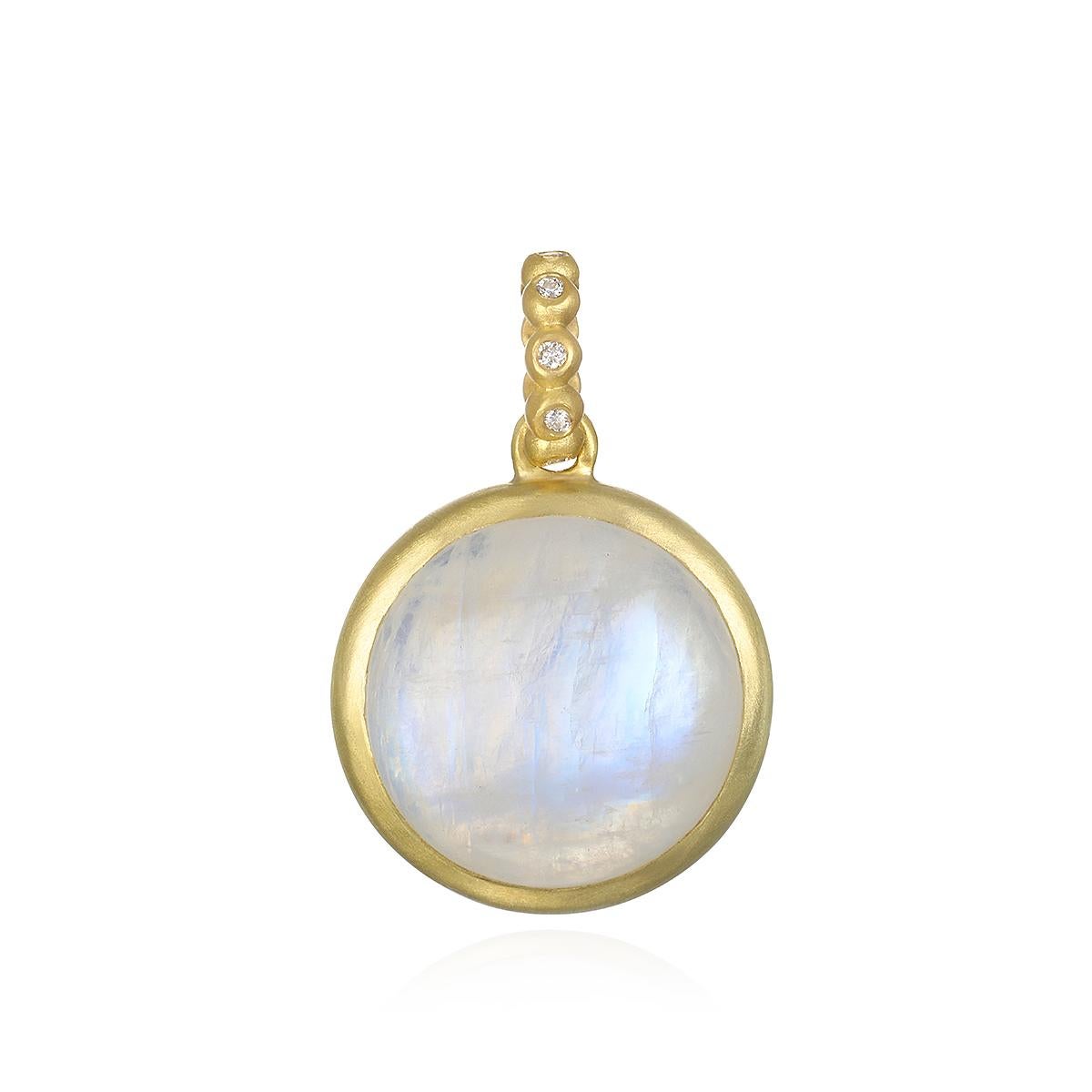 As ancient as the moon itself, the meaning of Moonstone lies within its energy. The pearly iridescence of this 18 Karat Gold Round Moonstone Pendant with its diamond bail evokes tranquility and exudes a glowing vitality. Worn alone or layered with