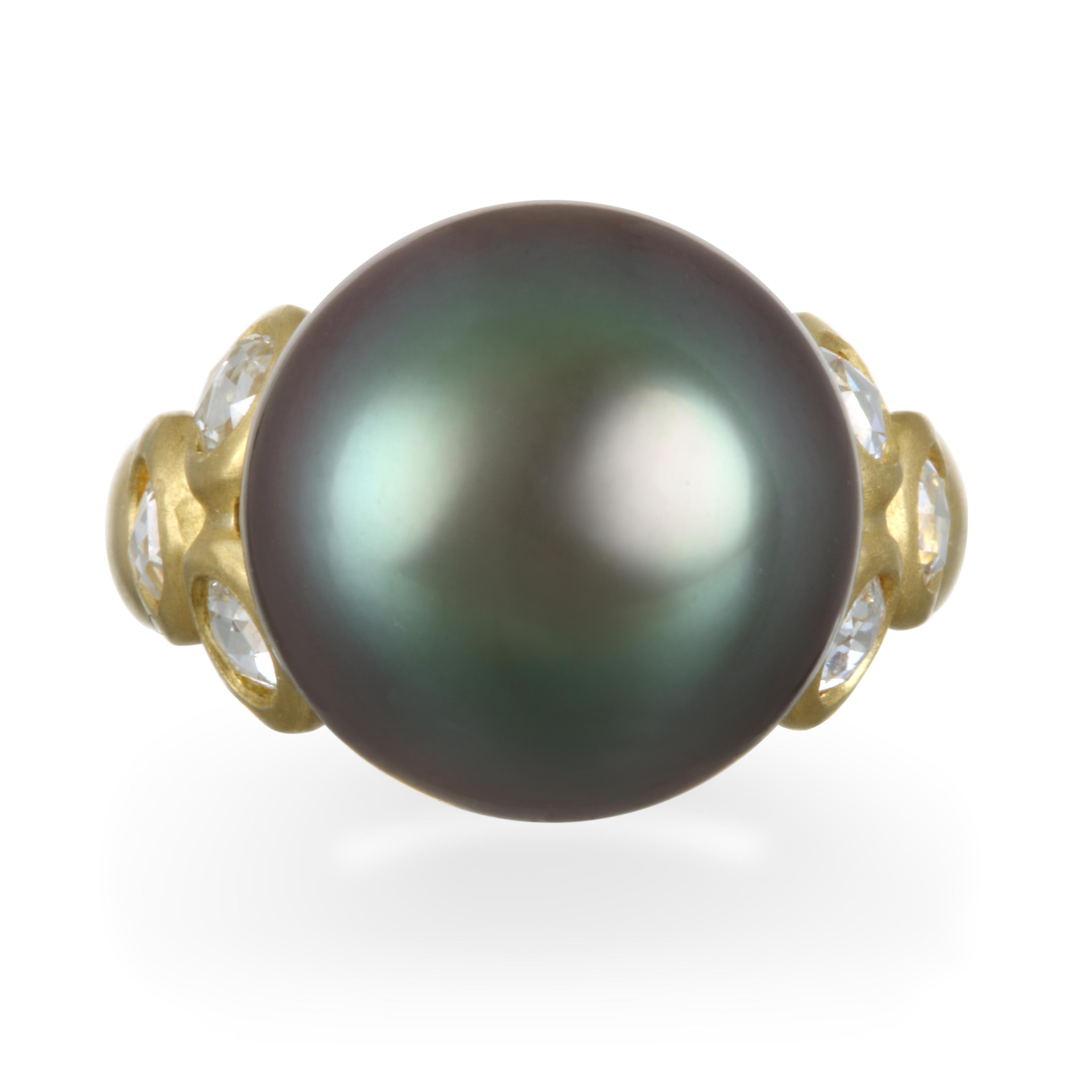 Faye Kim 18k Gold South Sea Tahitian Pearl and Diamond Cocktail Ring

White rose cut diamonds showcase this beautiful jumbo South Sea Tahitian pearl.  Meticulously handcrafted setting in 18k gold, matte finish. 

Size 7
6 White Rose Cut Diamonds =