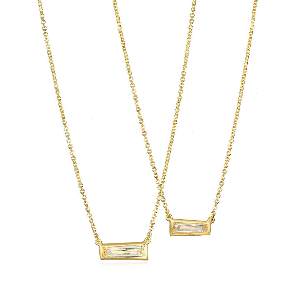 Faye Kim's 18K Gold* Tapered Diamond Bezel Necklace will add sparkle to any wardrobe and can be worn alone or layered with other necklaces. 

*In Faye Kim's signature 18k green gold, an alloy comprising 75% pure gold and 25% silver.
Customizable in