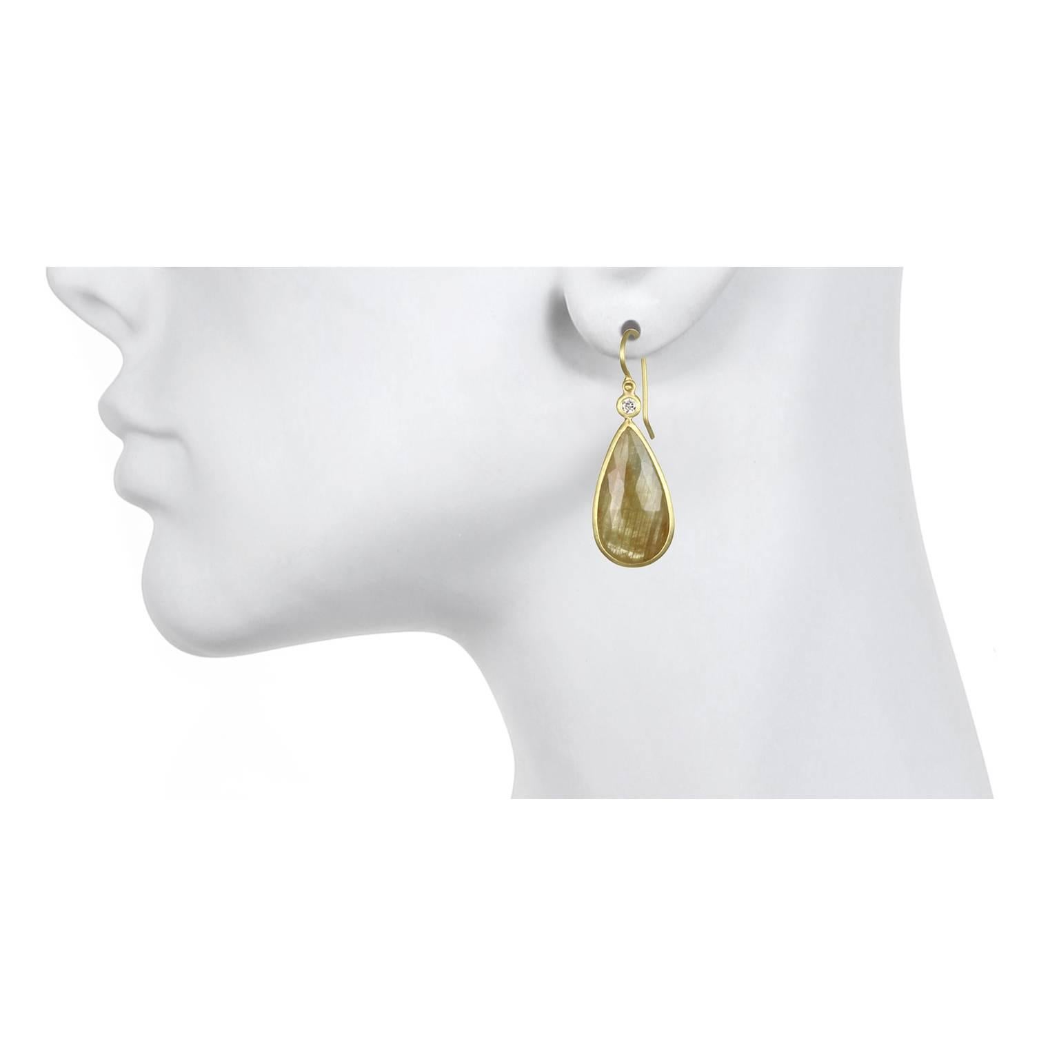 Simple, elegant and beautiful!  Handcrafted in 18k, rose cut yellow sapphire teardrop shaped slices are bezel set and paired with bezel set diamonds. The diamonds contrast and add a sparkle to the sapphire drop earrings. Understated and easy to