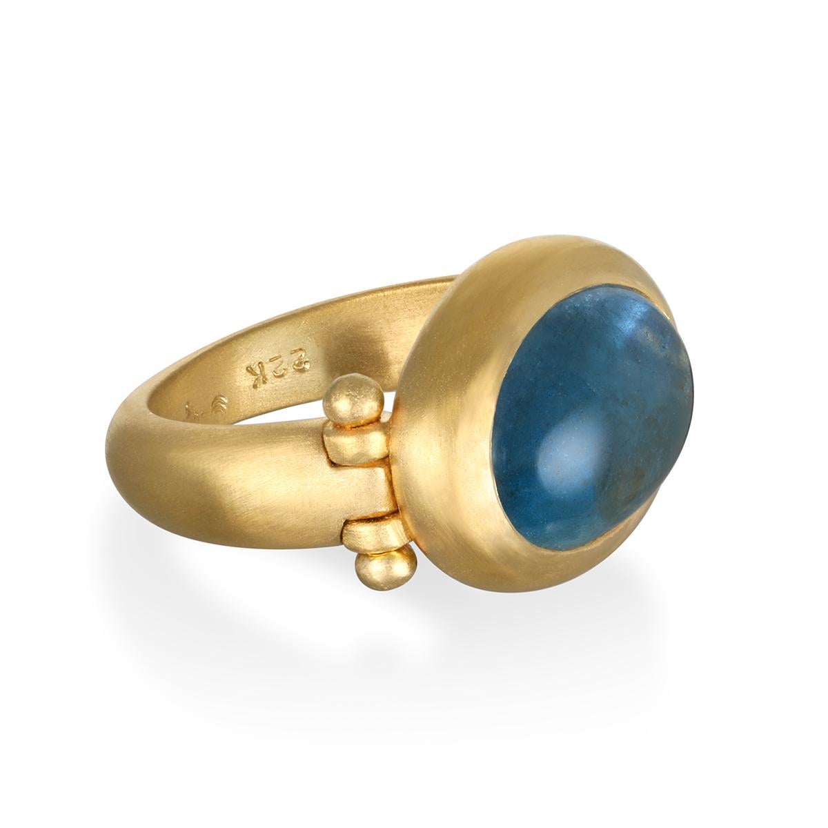 Faye Kim's 22 Karat Gold Aqua Hinged Ring, with its oversize stone, mesmerizing blue hue and half round shank, is beautifully bezel set and matte finished. The ring can be worn for any occasion.

Aqua 8.5 Carats
Bezel length x width 20 x