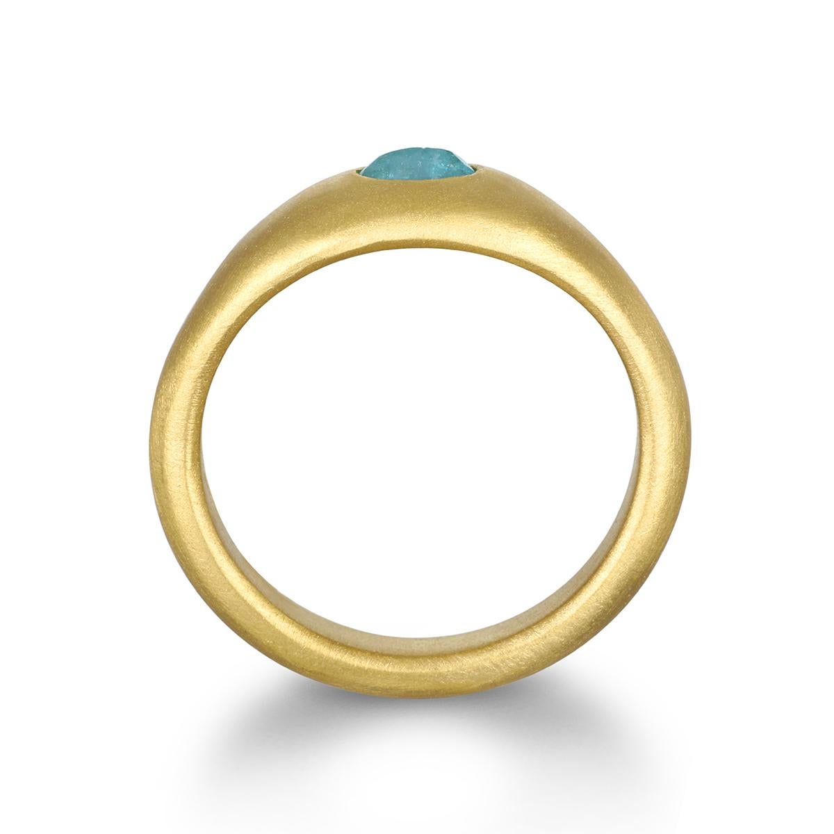 Faye Kim's one-of-a-kind ring features a Paraiba Tourmaline that's beautifully showcased in 22k gold with a matte finish, highlighting its captivating electric blue color and making it truly special.

Tourmaline .30 Carats
Size 6.5, can be