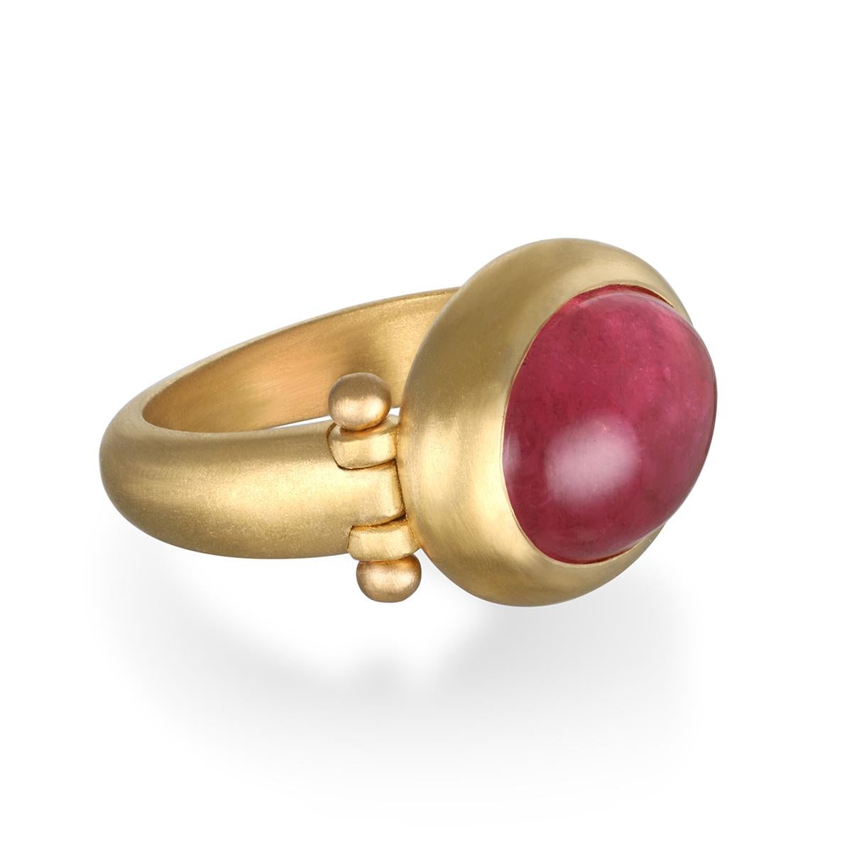 Faye Kim's 22 Karat Gold Pink Tourmaline Hinged Ring, with its oversize stone, spectacular berry hue and half round shank, is beautifully bezel set and matte finished. The ring can be worn for any occasion.

Tourmaline 10 Carats
Bezel length x width