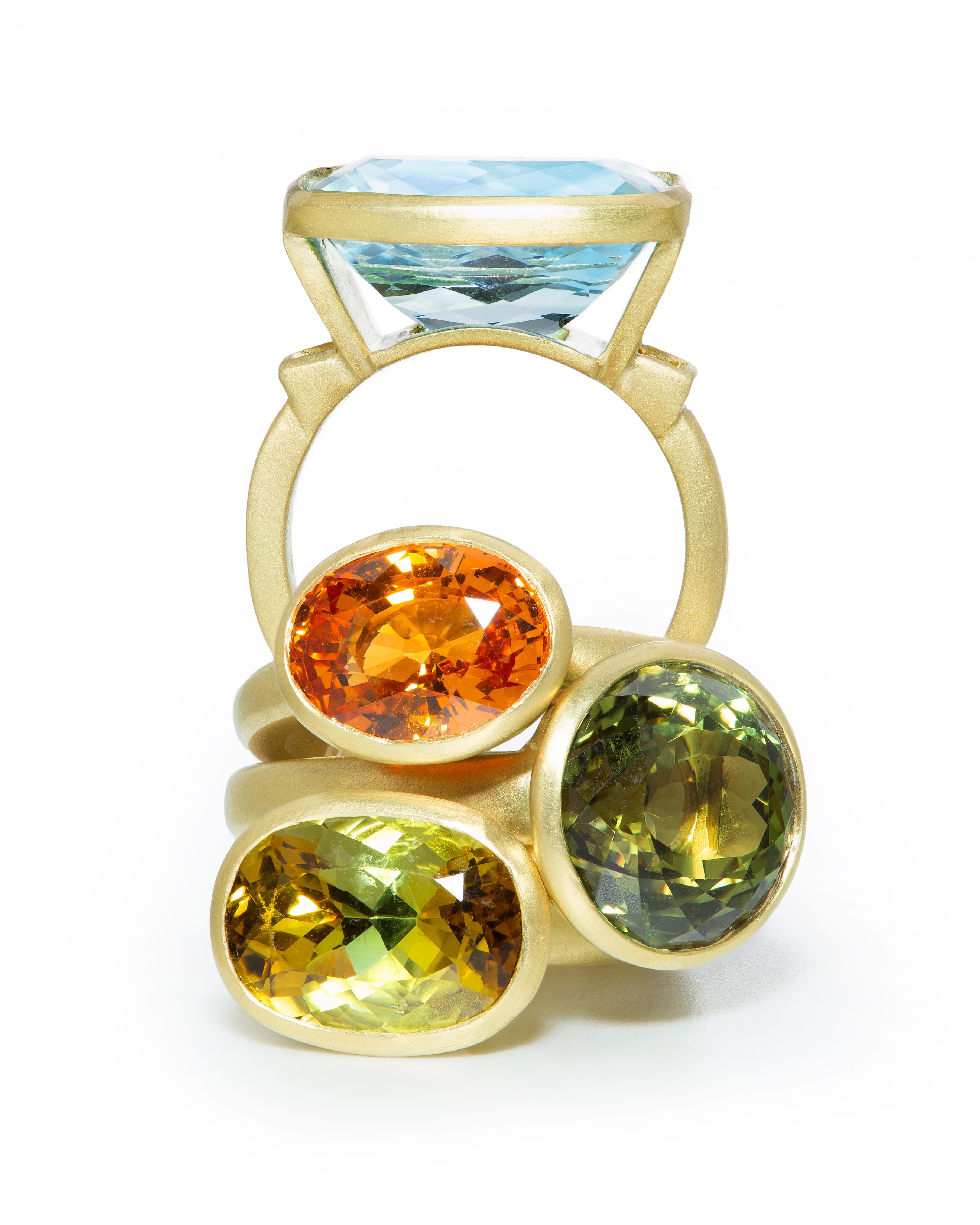  Faye Kim's  Cushion Cut Yellow-Olive Tourmaline Ring.

Tourmaline:  5.54 Carats
Dimensions: 14 x 10.5 mm
Shank Width: 3.5 x 2.5 mm

Size: 6.75

Made in U.S.A. Please inquire about additional pieces shown in listing. 