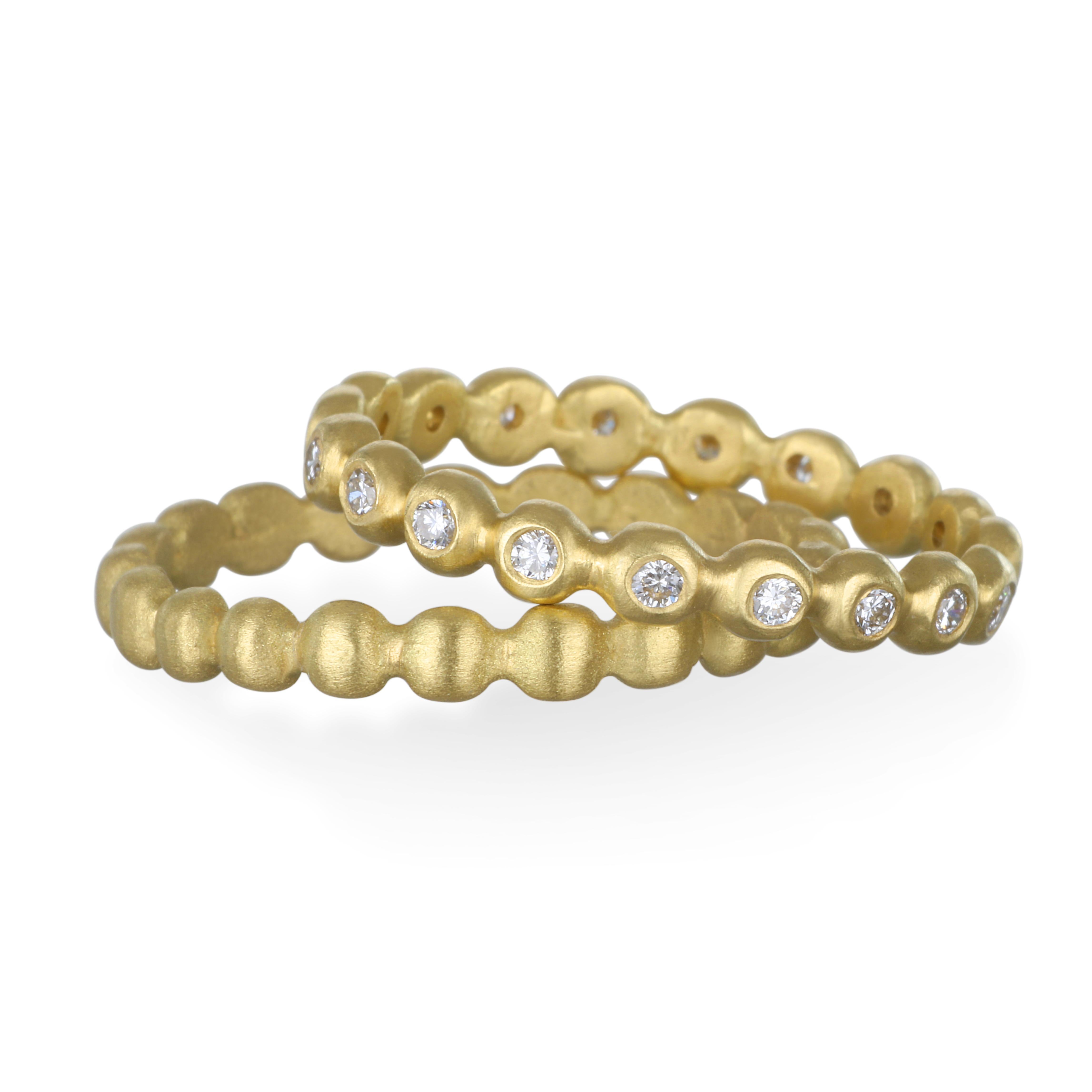 Faye Kim's signature diamond small granulation bead ring in 18 karat gold offers endless possibilities for stacking or wear on its own for a delicate, clean, contemporary look.  

Diamonds:  .35 Carats
Width:  3 MM (1/8