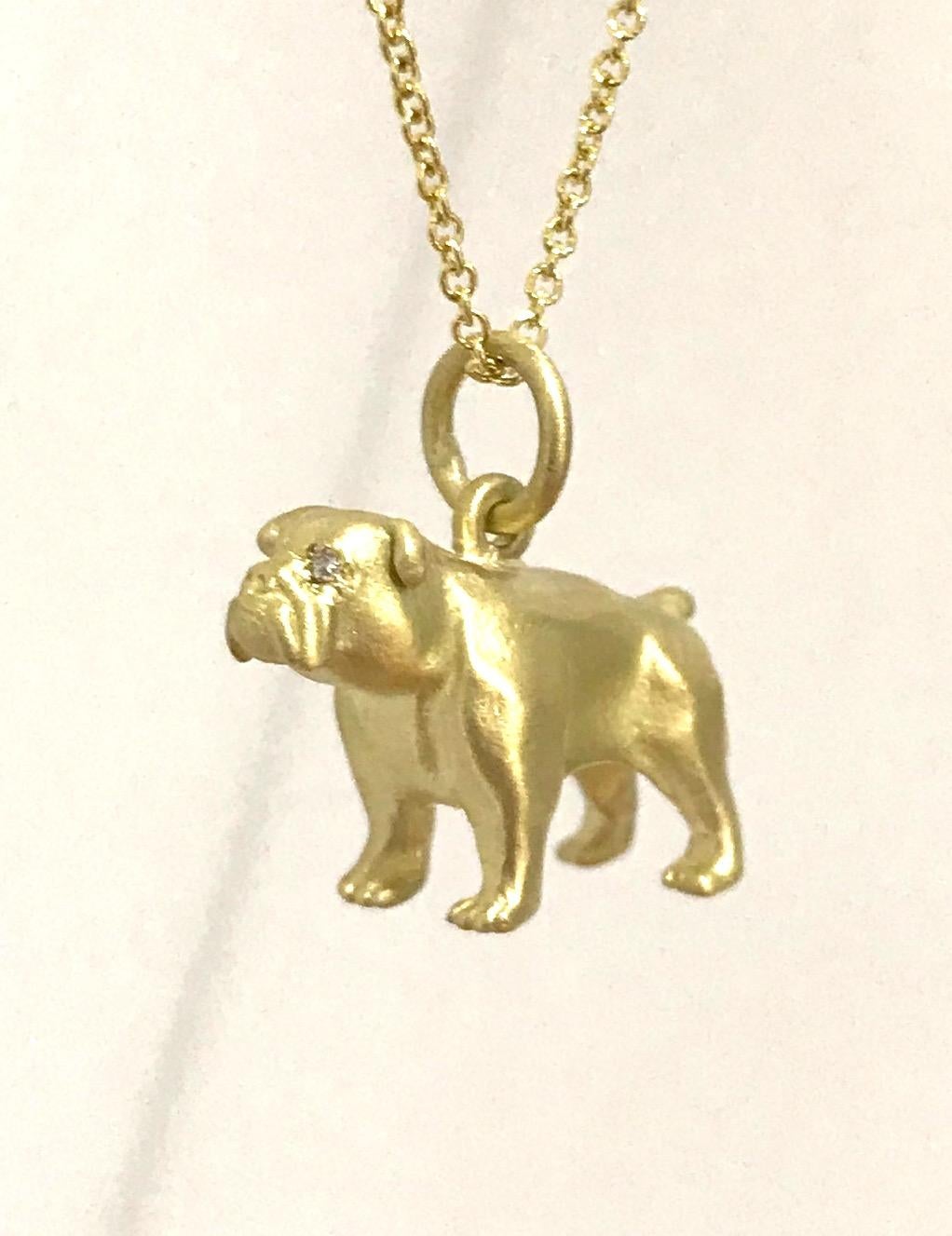 Bulldogs symbolize guidance, protection, loyalty, fidelity, faithfulness, watchfulness, and love. For savvy bulldog lover, show your true feelings and never leave your dog at home by wearing this sparkling charm either on a chain or leather cord