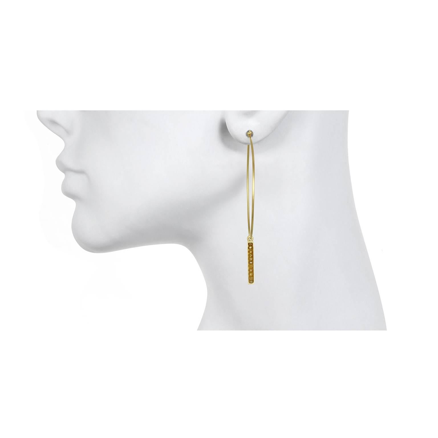 Slick and linear are the thoughts that come to mind when sporting these elegant 18k gold and diamond bar drops.  The taupe, olive green hues are neutral yet sparkly.  To be worn with our favorite 18k gold wire hoops (sold separately).  Perfect to