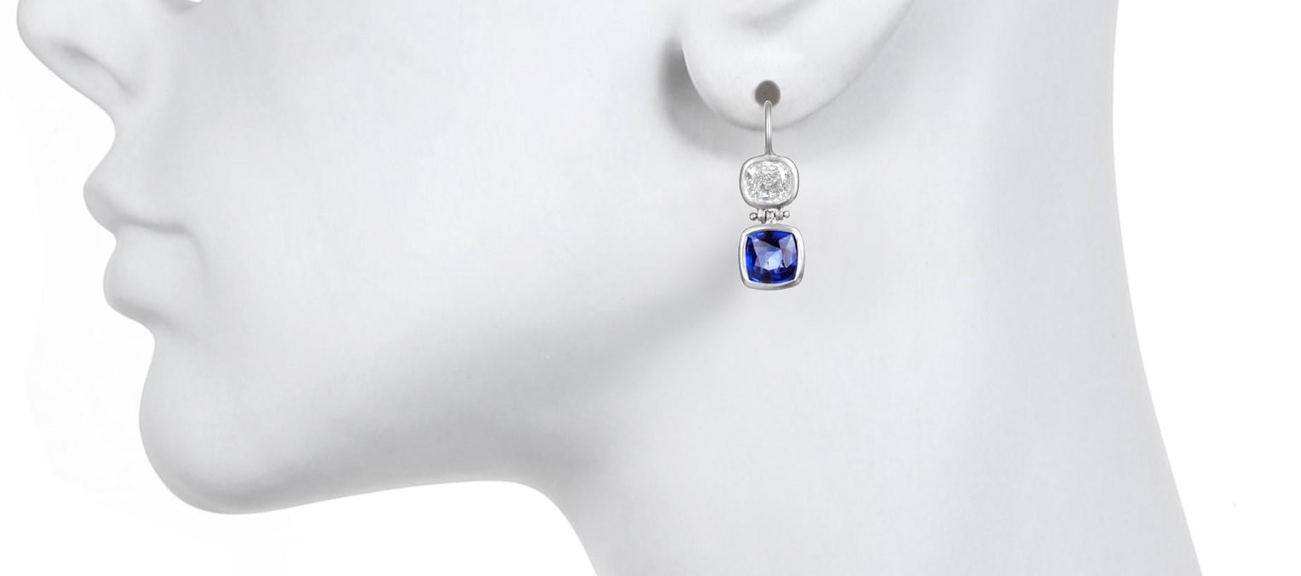 Enter into luxury with these Matte Platinum Diamond and Sapphire double hinged earrings.  Hosting spectacular quality, color and interesting shapes of diamonds and sapphires, these sparkly and unique earrings will elevate you to the heavens and