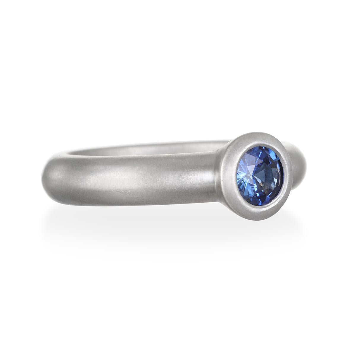 A beautiful, vivid shade of blue, this Ceylon Blue Sapphire ring is bezel set in platinum with a matte finish for a clean, timeless look. It can be worn alone as a statement piece or stacked with other rings. 

Sapphire:  1.0 Carat
Bezel Dimension