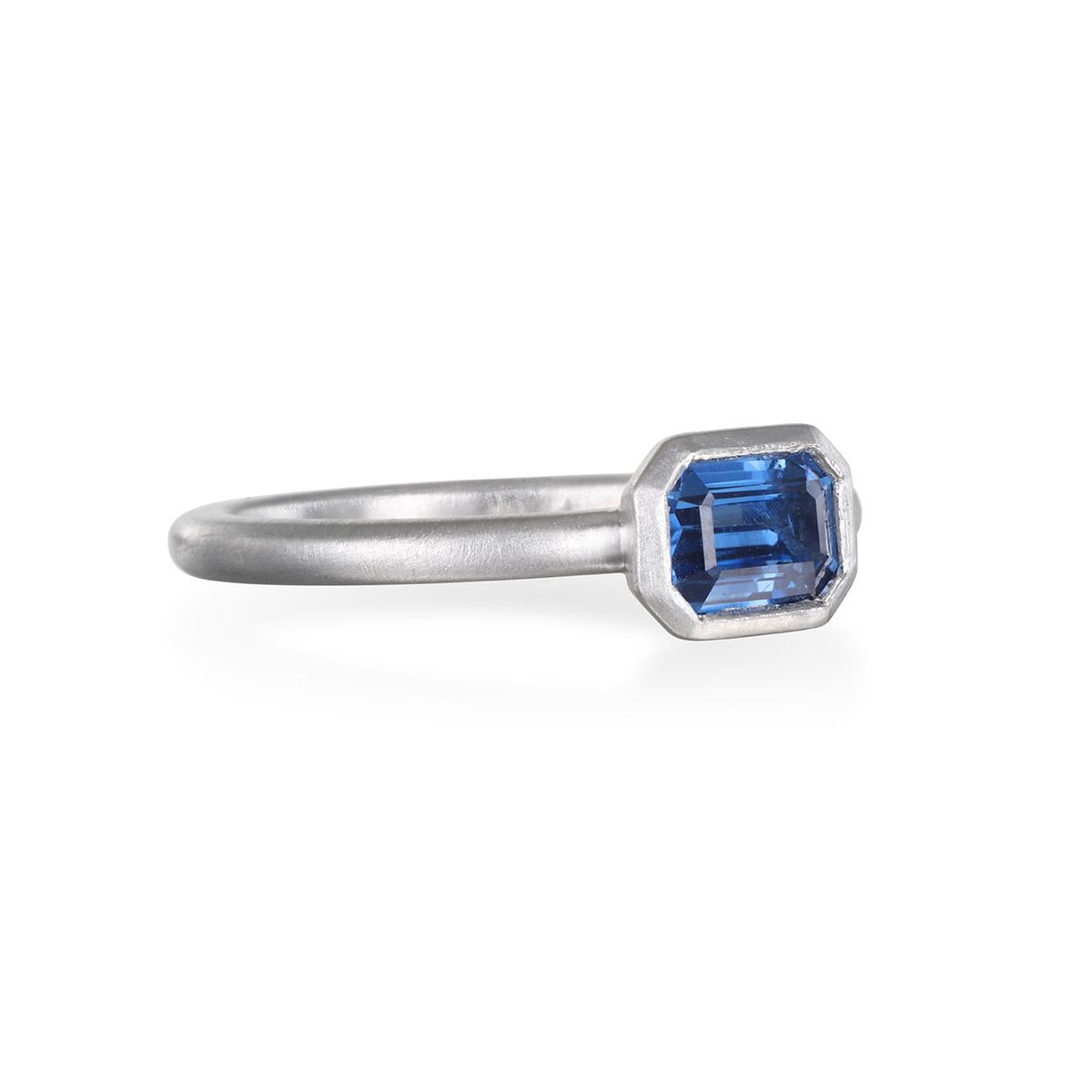 Faye Kim's Platinum Ceylon Sapphire Emerald Cut Ring, with its bright, vitreous luster, is beautifully bezel set and matte finished. 

Sapphire .86 carats

Size 6.75, can be sized

Ring shown with similar Ceylon Sapphire rings and pendant, sold