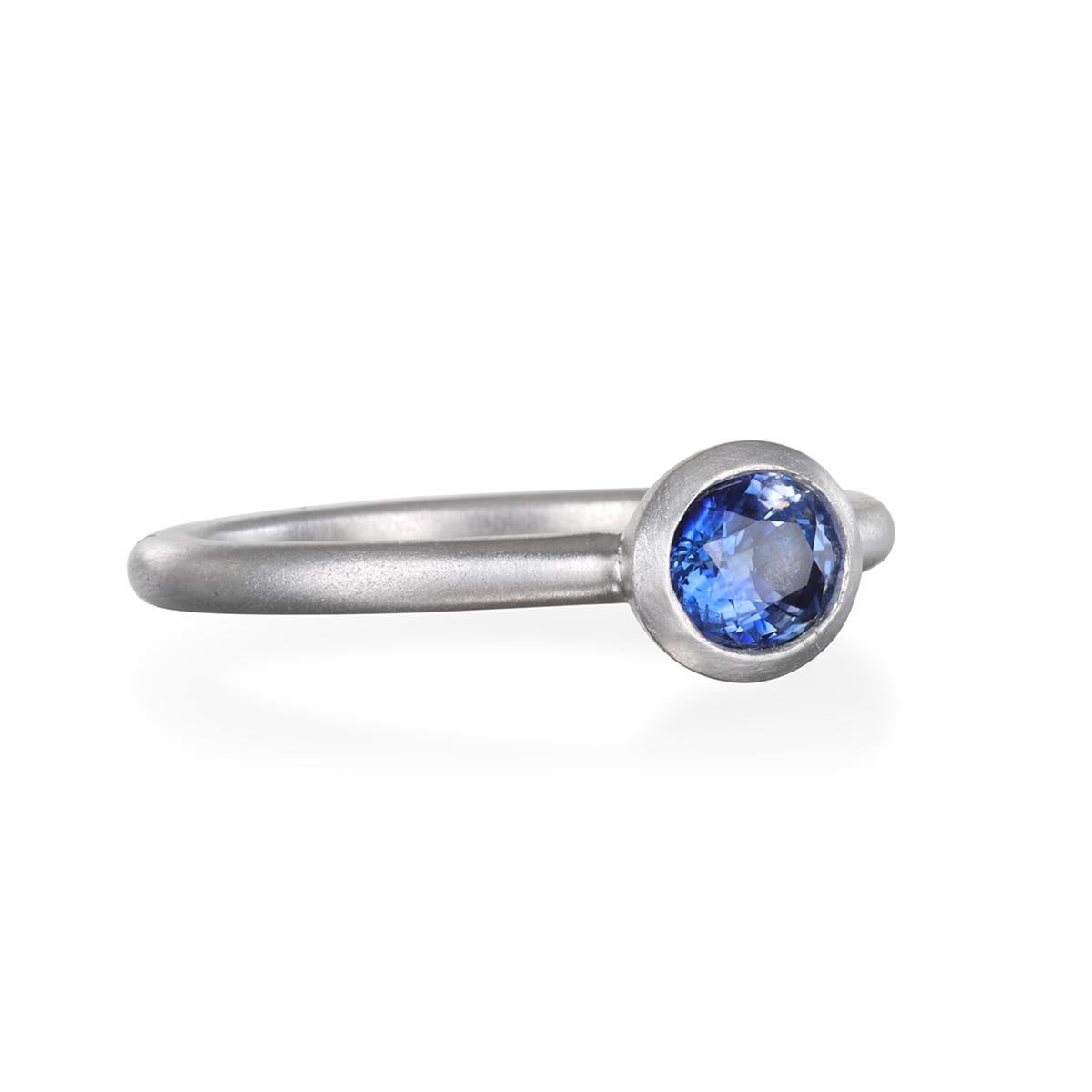 Faye Kim's Platinum Ceylon Sapphire Oval Ring, with its bright, vitreous luster, is beautifully bezel set and matte finished. 

Sapphire .76 carats

Size 6.75, can be sized

Ring shown stacked with similar Ceylon Sapphire rings and pendant, sold