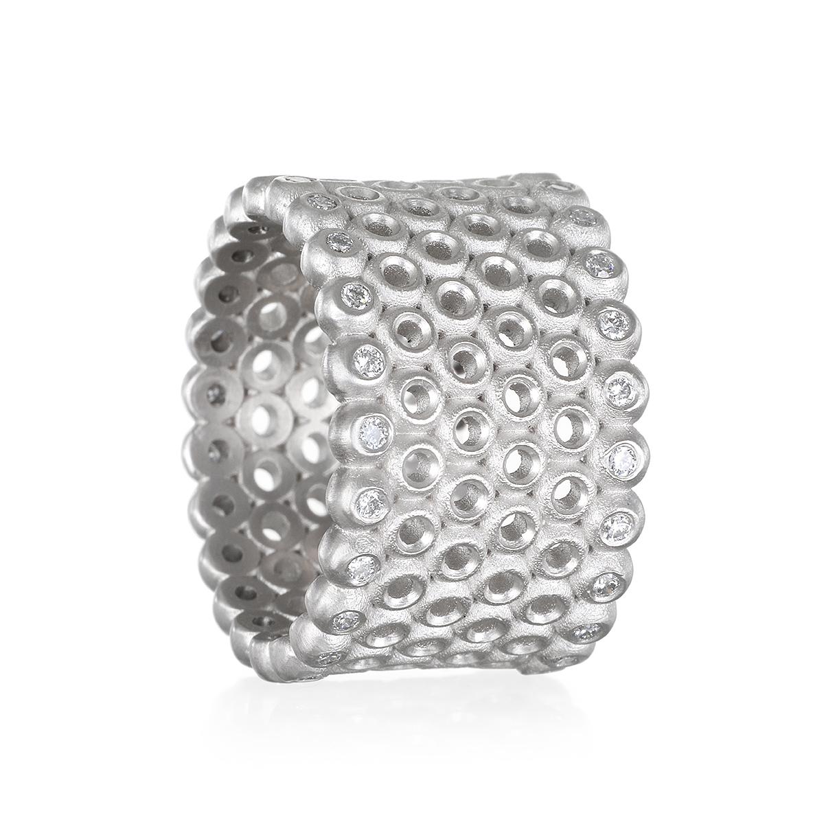 Crafted in platinum with a matte finish and sparkling diamond borders, Faye Kim's cigar band is a unique, statement piece with an edge. 

Diamonds:  .50 Carats Total Weight 
Width: 14MM
Size 8.5
