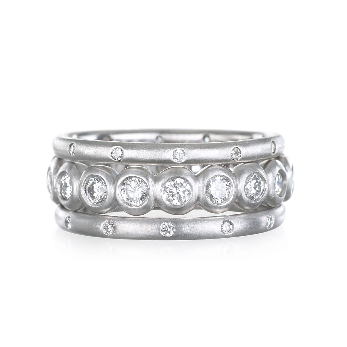 Eminently wearable, Faye Kim's Platinum Diamonde Eternity Band Ring is handcrafted with bright, round brilliant cut diamonds in a bezel setting.  A contemporary vibe that works with all styles; wear alone for a clean, sleek look or stack with others