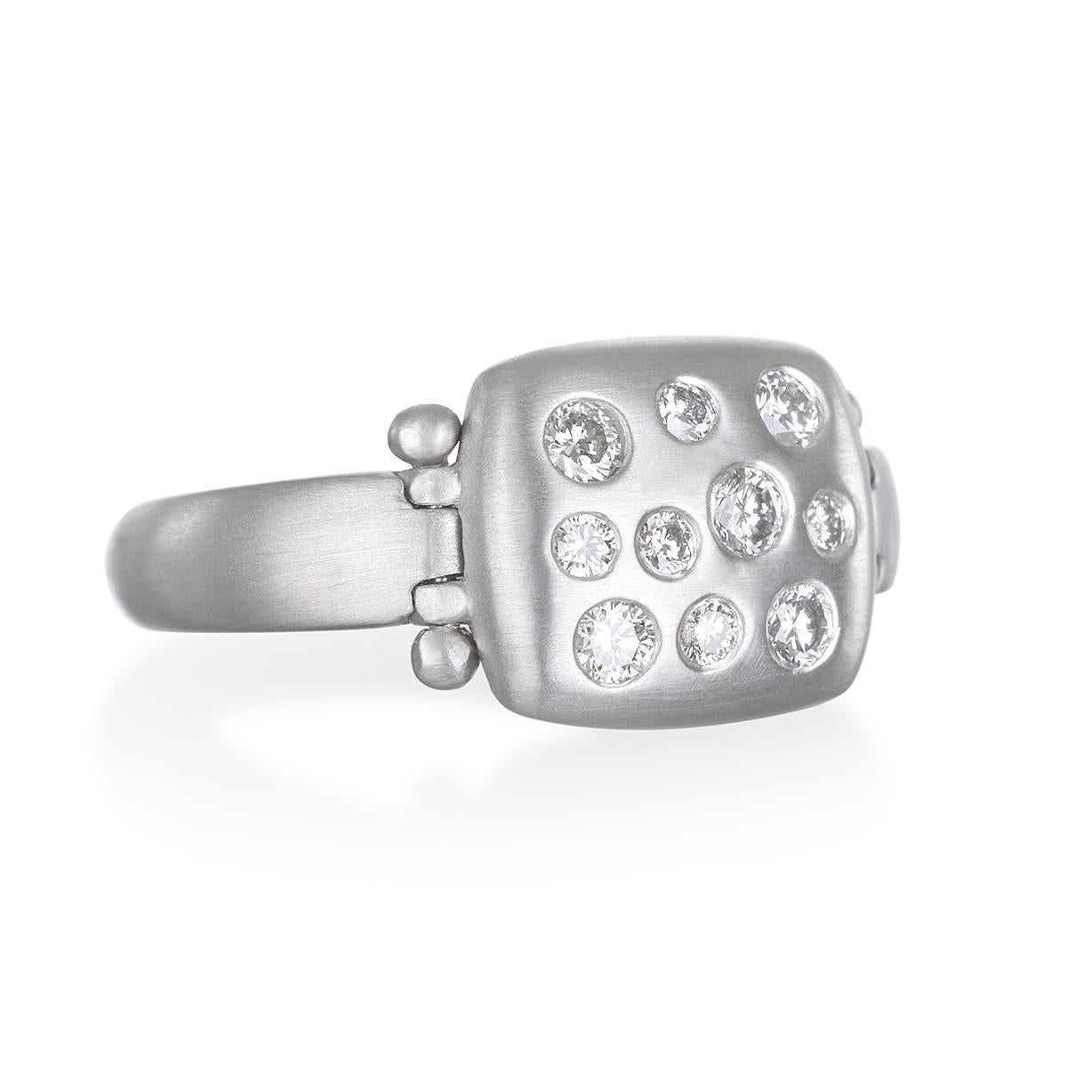 A modern-day take on the Signet Ring, Faye Kim's Platinum Diamond Hinged Chiclet Ring sparkles with burnished bright, white diamonds. With its flattering chiclet or antique cushion shape, it's a great look worn on any finger and can be stacked with