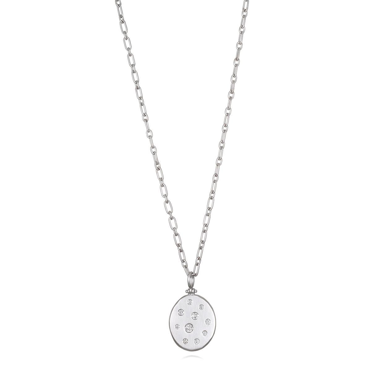 Versatile and easy to wear, Faye Kim's Platinum Diamond Large Hinged Dog Tag Pendant is perfect for every day. The pendant, which shimmers and sparkles with its diamonds, is matte-finished in platinum, making it ideal for any occasion. Whether worn