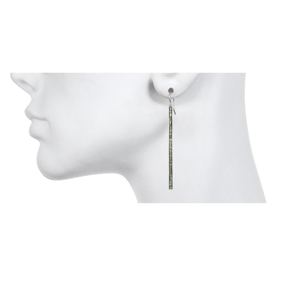 Feminine yet edgy, the matchstick style platinum earrings feature green diamonds that are channel set for a clean, sleek look.  The hinge detail provides movement and sparkle. Matte-finished.
Diamonds: Natural green color 3.22 Carats twt
Length