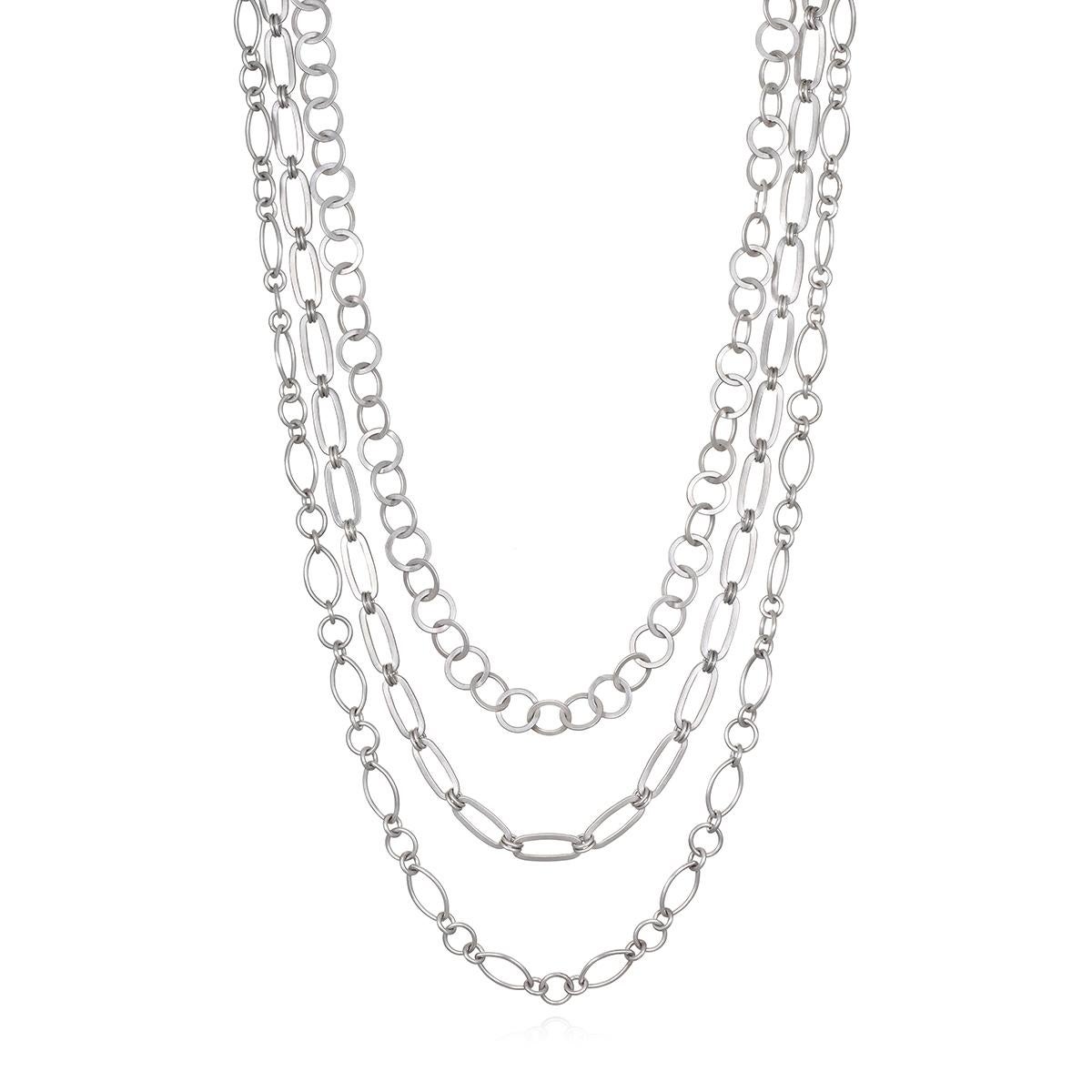 Faye Kim Platinum Handmade Mini Marquise Link Necklace is both classic and versatile, and is certain to become a must have in every jewelry wardrobe. Alternating mixed shaped links give texture and uniqueness to this chain, bringing it to a whole