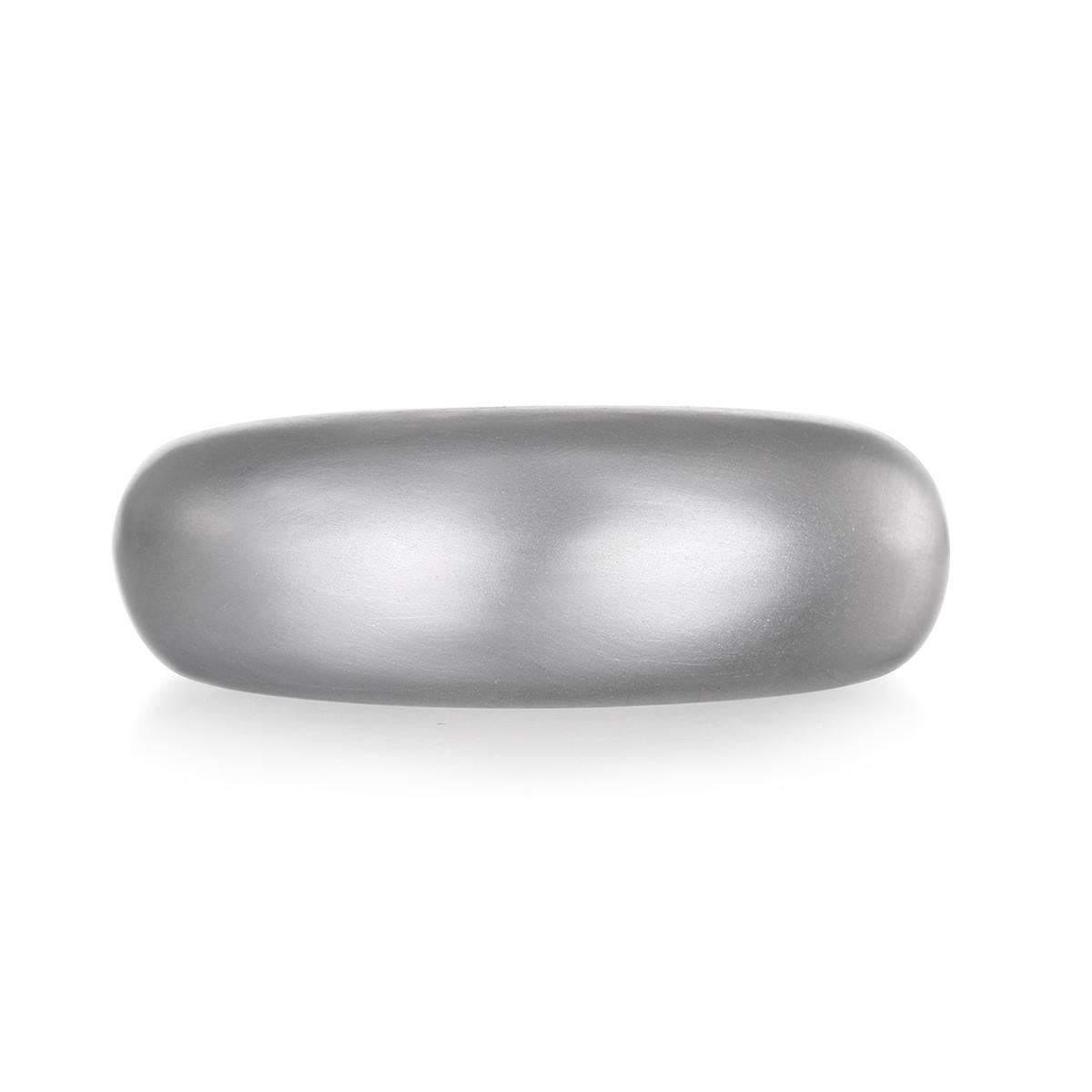 Faye Kim's Platinum Low Dome Ring, with its clean, understated design and smooth, polished finish, can be worn alone or paired with other stacking rings. The ring's slightly chunky and effortlessly chic style enables it to be incorporated into