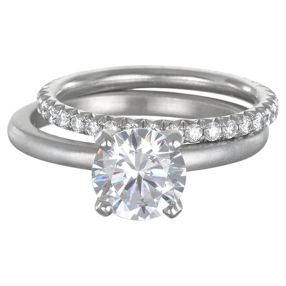 Faye Kim, bague d'éternité en platine à micropavé

Diamants .77 twt

Taille 7 - peut être redimensionnée

L'alliance éternelle est présentée avec la bague de fiançailles solitaire, vendue séparément. D'autres bandes similaires sont également