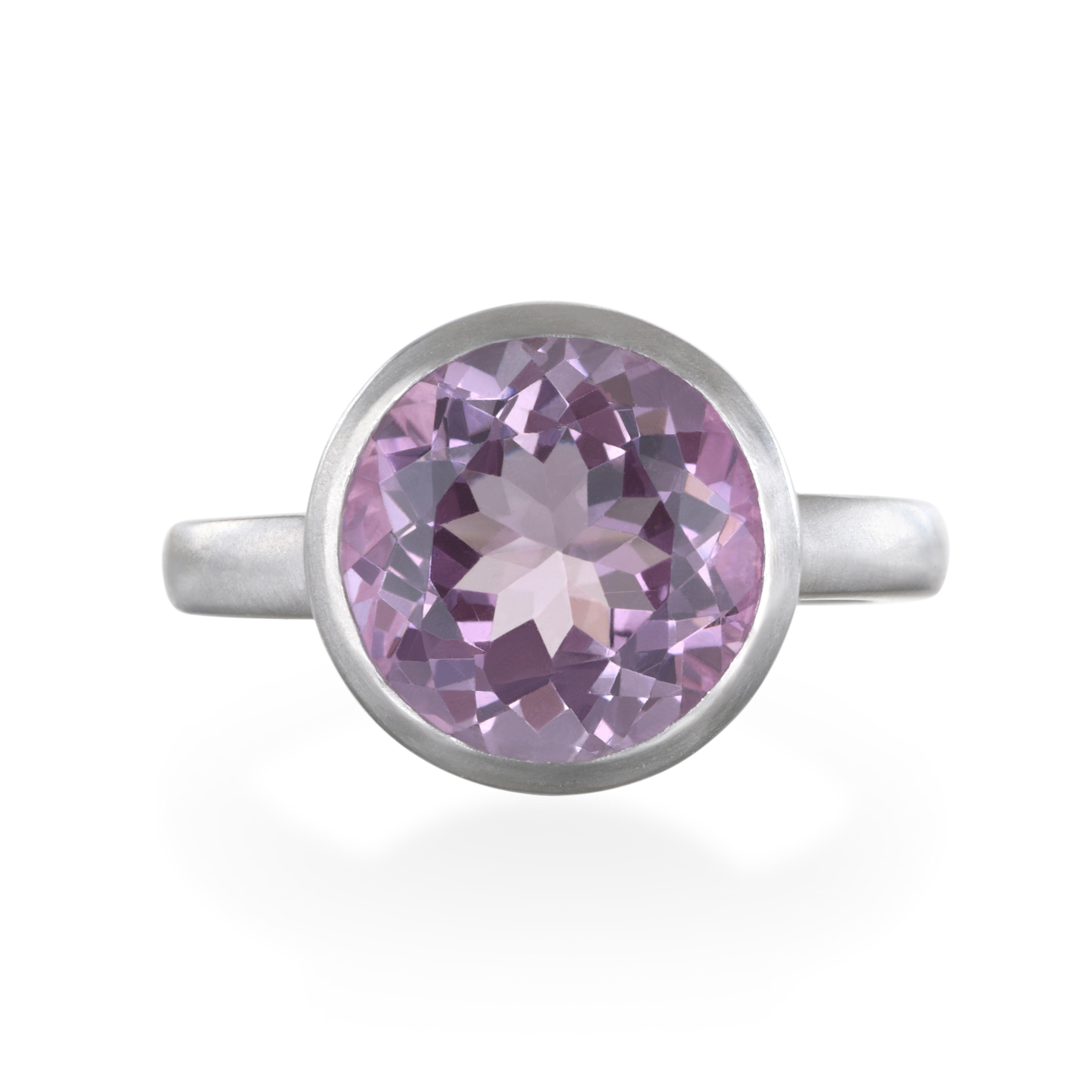 Beautiful Purple Scapolite in a matte platinum setting.
Scapolite gemstones are prized for their color, particularly when they are pink to violet. Today's collectors value the high-quality stones sourced from the Umba River area northeast of