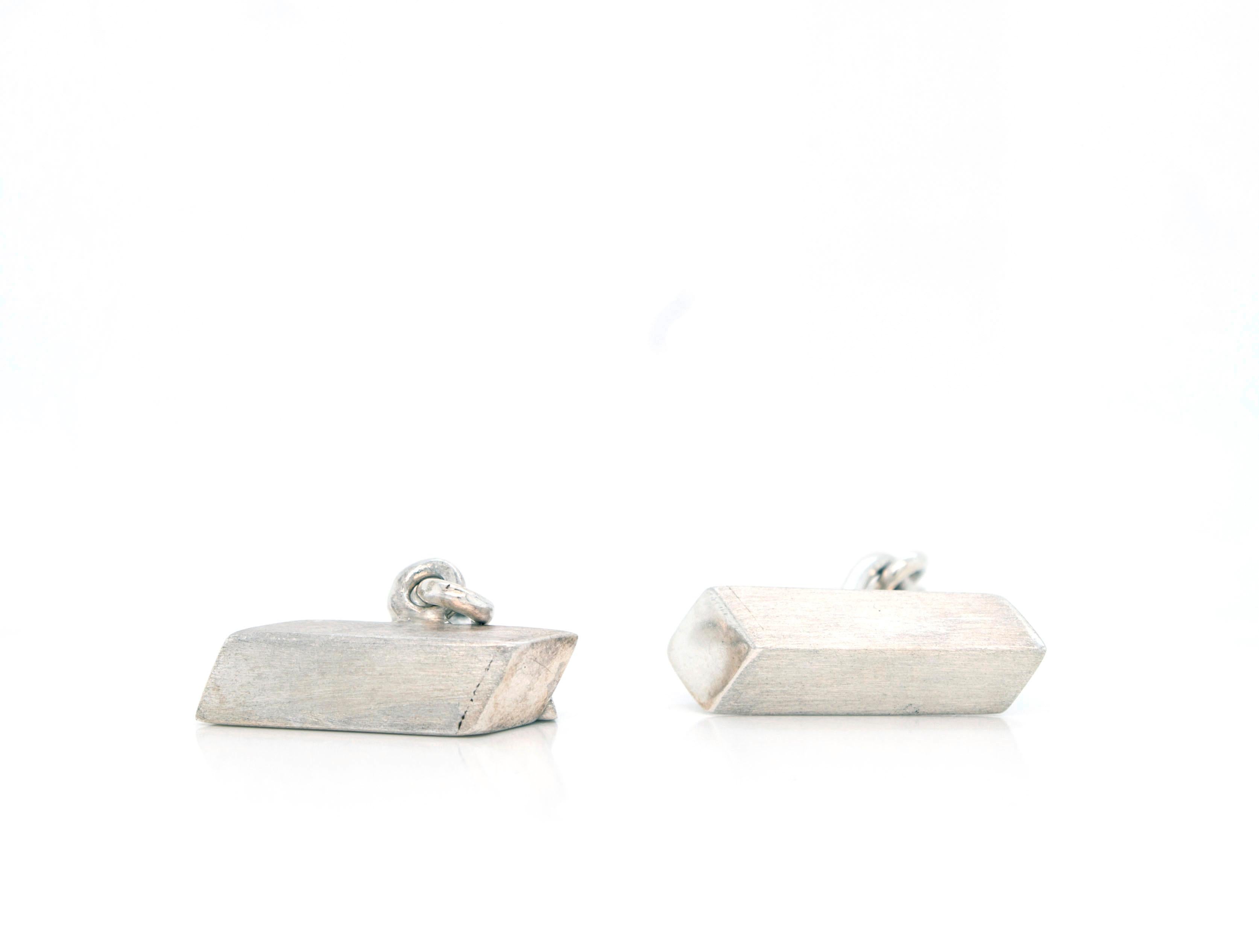 Faye Kim Sterling Silver Trapezoid Cufflinks

Finish off your formal look with these handcrafted Sterling Silver cufflinks.  Elegant and sophisticated modern look with a matte finish.

Lenght x Width: 1