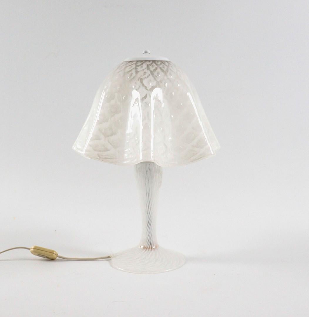 Fazzoletto Murano glass table lamp. Italy circa 1960's. Hand blown clear Murano glass in handkerchief forms using Fazzoletto technique with white patterned detail at shade and base. EU plug. 
