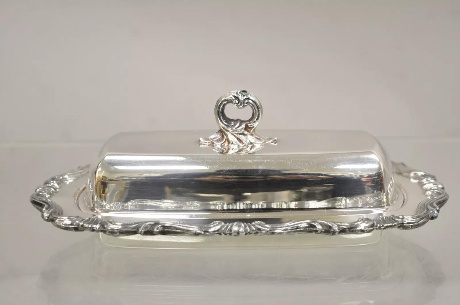FB Rogers Silver Co. 1959X Plato para mantequilla cubierto y plateado. Mediados del siglo XX. Medidas: 3