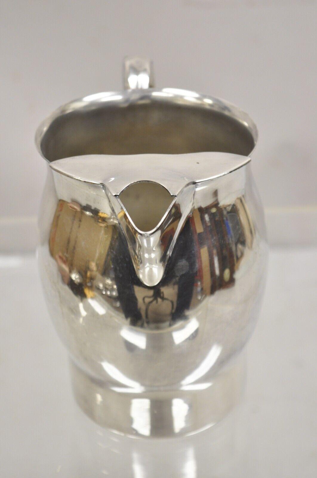  FB Rogers Silver Co Silver on Copper 7504 Water Pitcher. Circa 1970s. Measureme For Sale 4