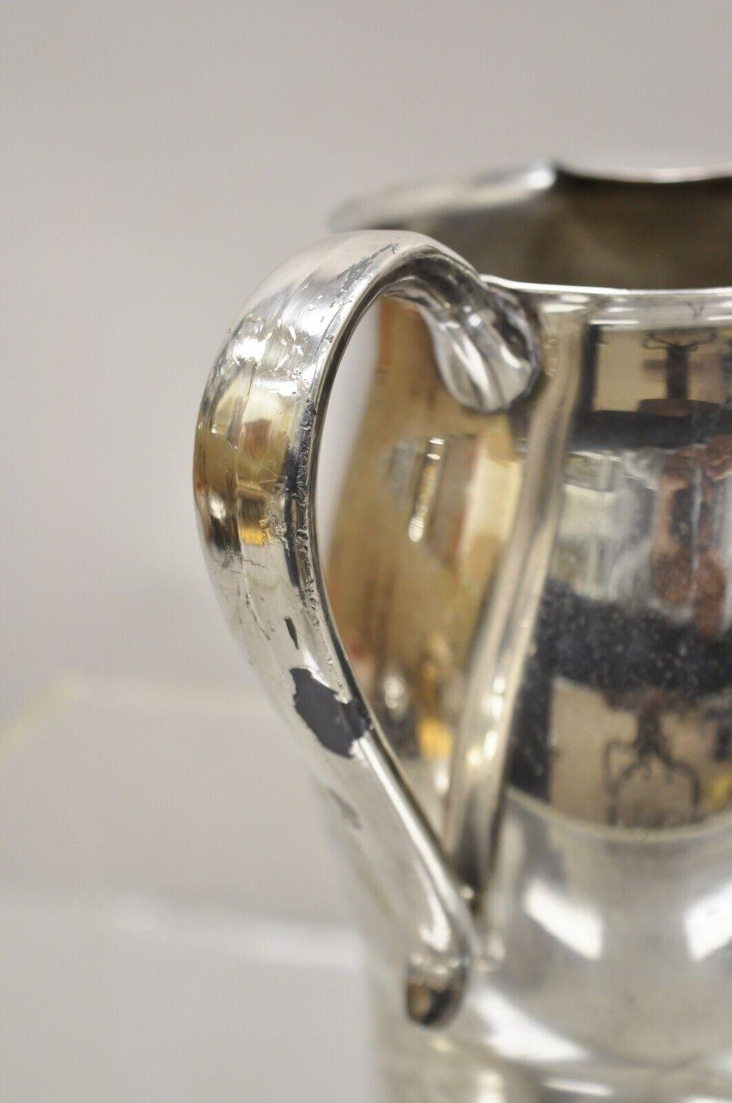 Late 20th Century  FB Rogers Silver Co Silver on Copper 7504 Water Pitcher. Circa 1970s. Measureme For Sale