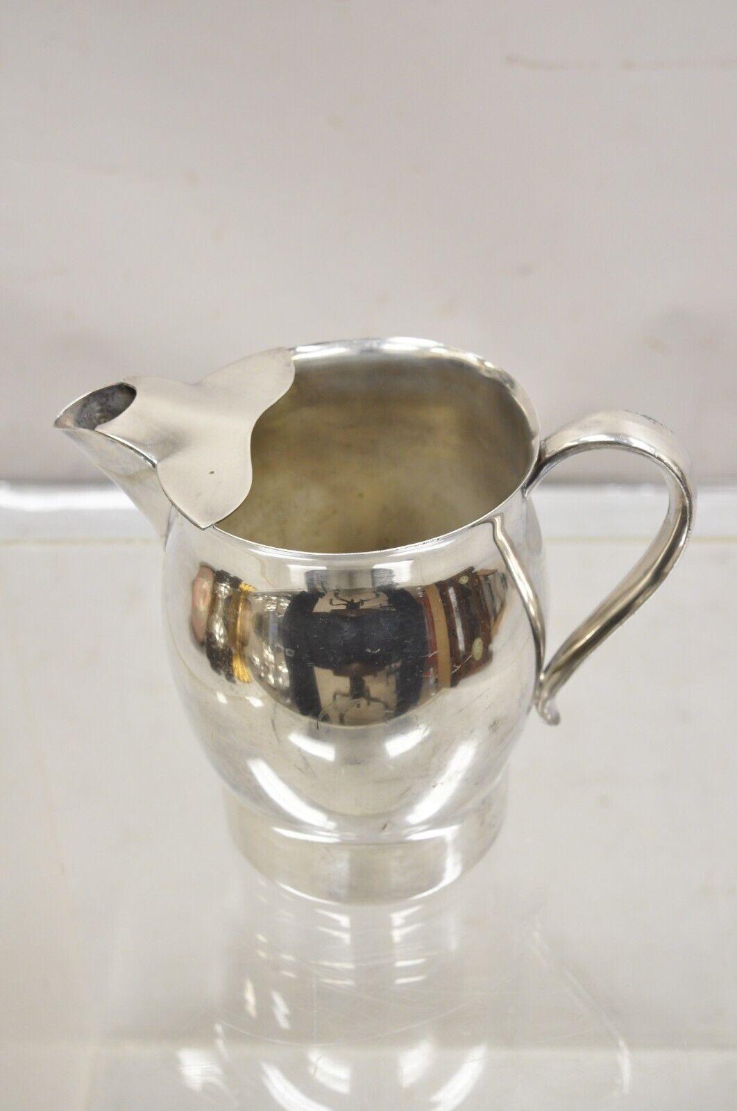  FB Rogers Silver Co Silver on Copper 7504 Water Pitcher. Circa 1970s. Measureme For Sale 1