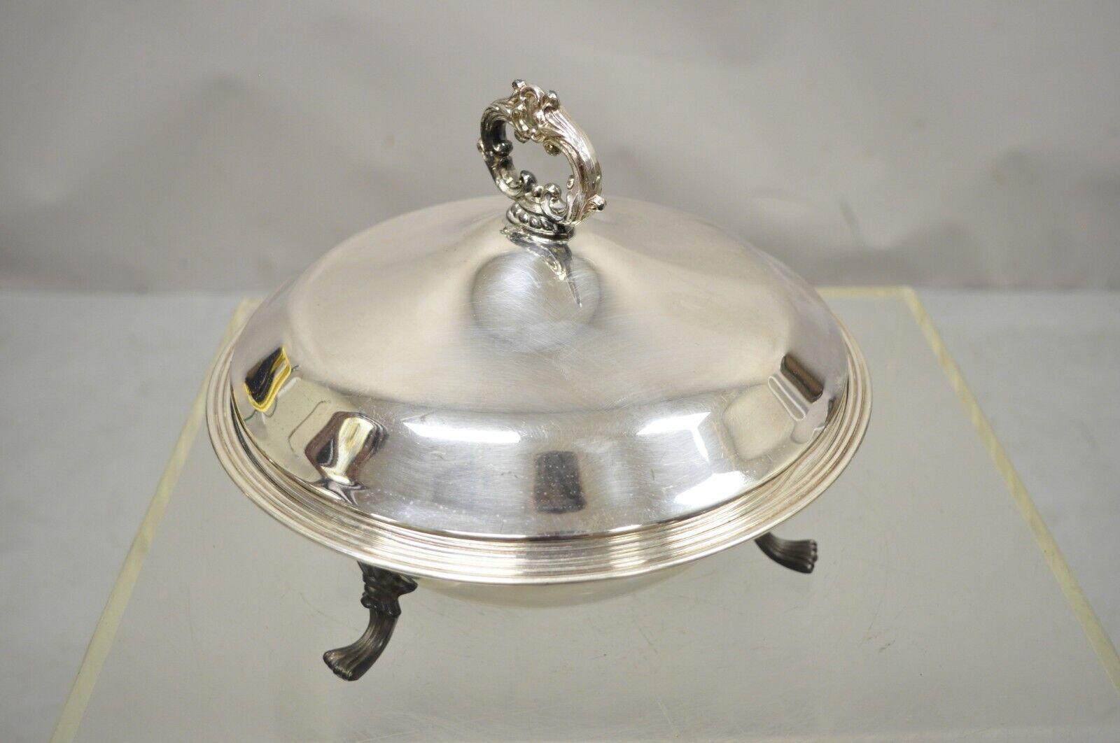 FB Rogers Silver 1158 covered serving dish bowl platter Pyrex Liner. Item features raised on feet, Pyrex glass liner, lidded dome top, original stamp, great style and form. Circa mid 20th Century. Measurements: 8