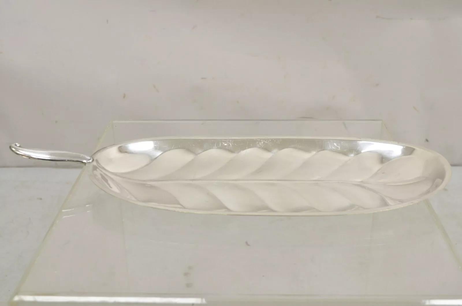 F.B. Rogers Silver Plate Oval Banana Leaf Form Serving Tray Platter w/ Handle B. Circa Mid 20th Century. Measurements: 1.5