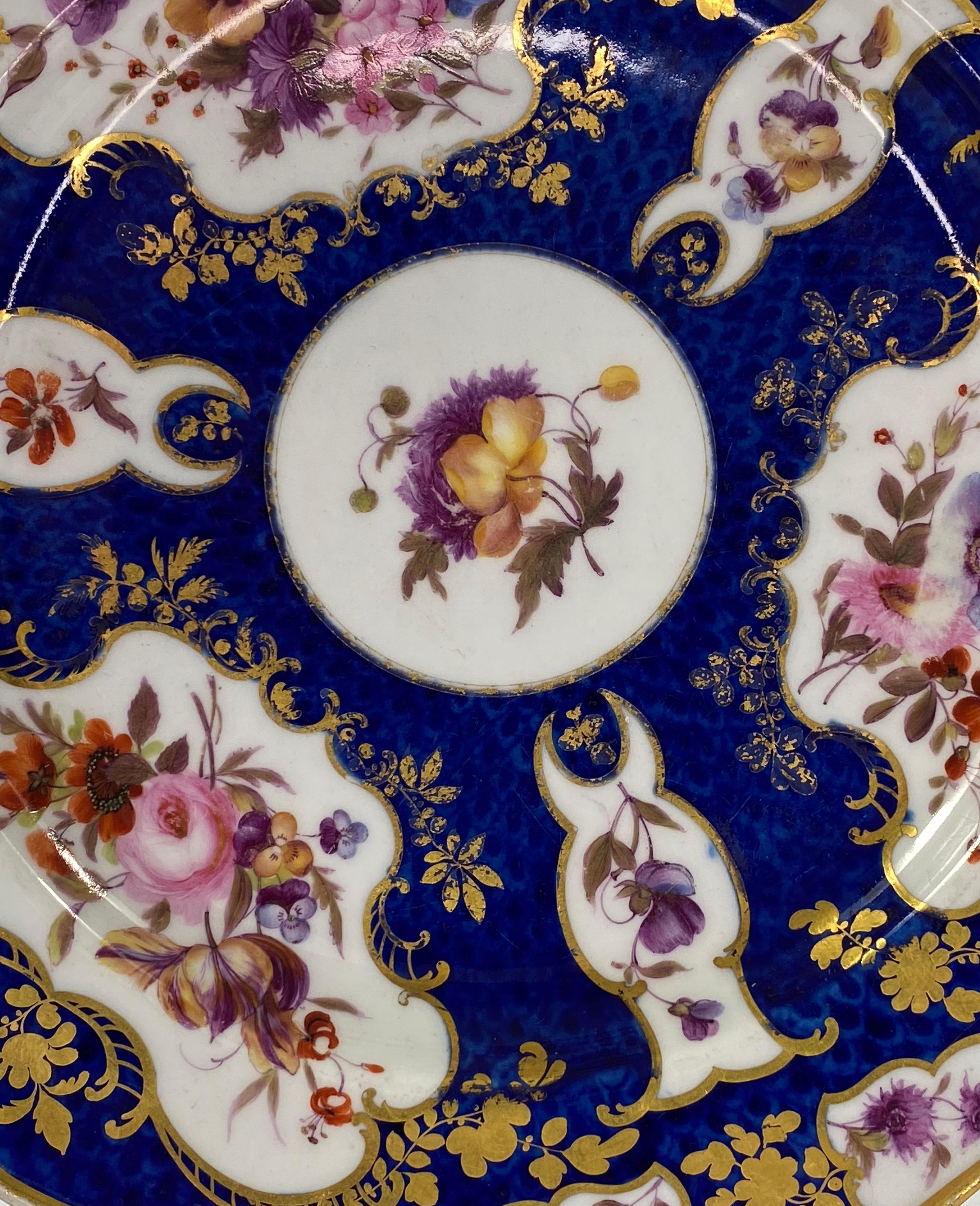 Flight Barr and Barr Worcester porcelain dish, c. 1815, with interesting provenance. The ‘Blue Scale’ ground dish painted with elaborate gilt scroll panels, containing beautifully painted studies of flowers.
The reverse with a label suggesting that