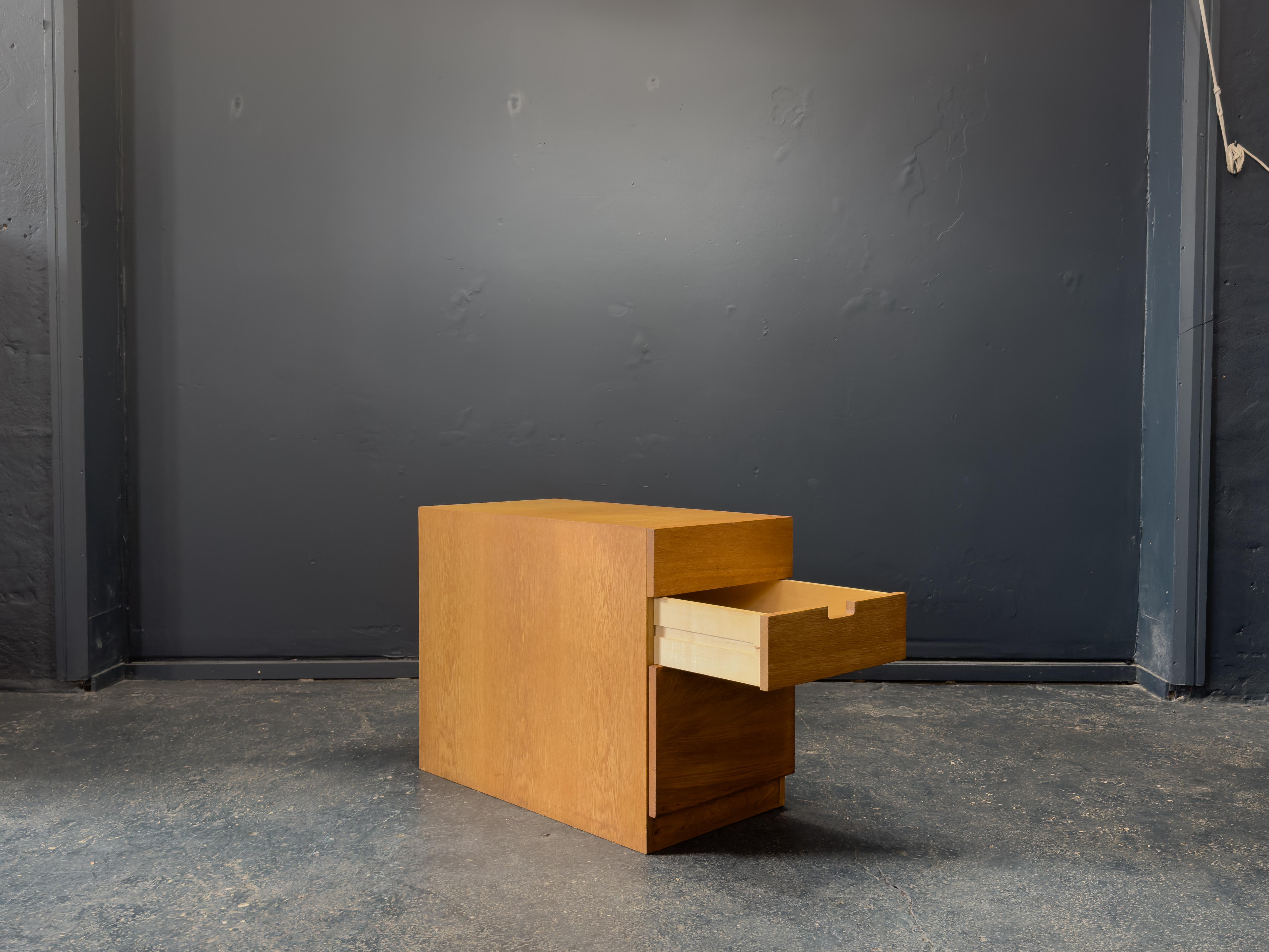 This oak filing cabinet by FDB Møbler is a striking example of pared-back Danish modernism, defined by its strong, rectilinear silhouette and understated presence. The form is confidently minimal but strong in shape, crafted from warm, finely