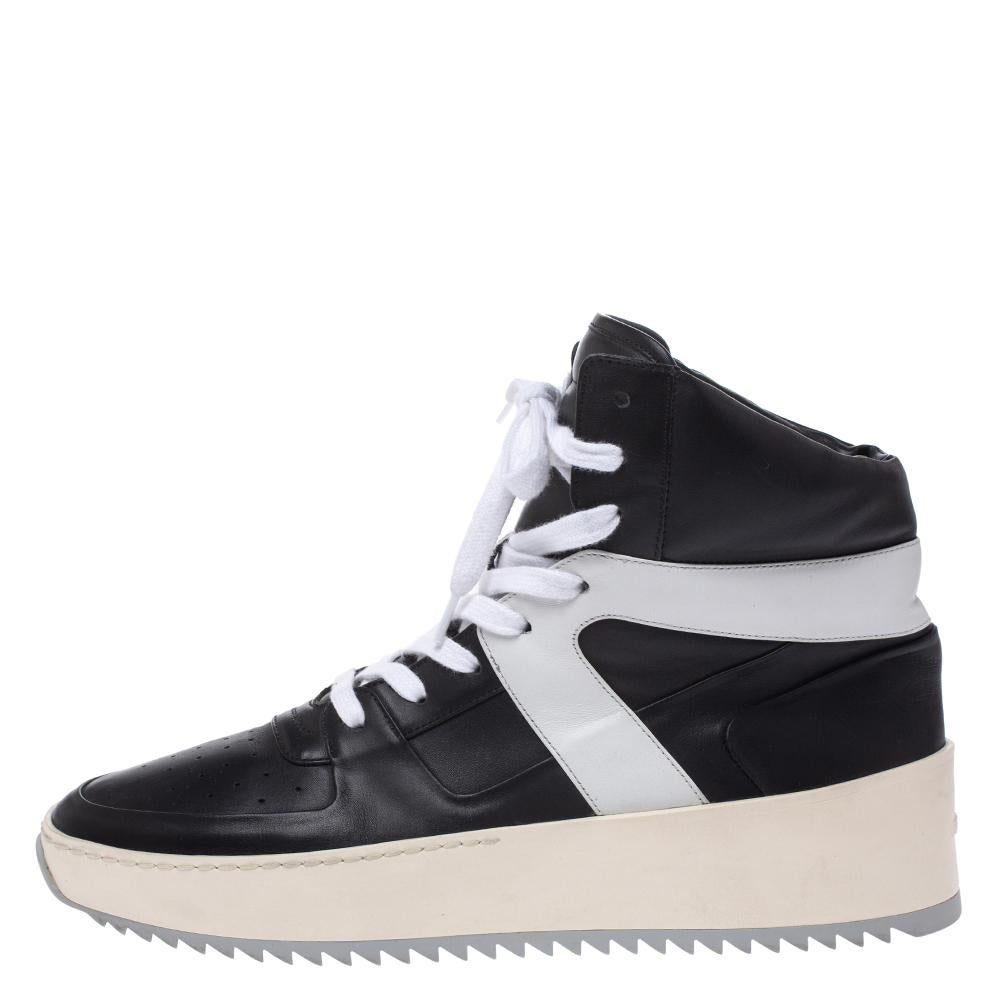 Featuring a high top silhouette that makes them cool and smart, this pair of Basketball sneakers from the label, Fear Of God is designed to impart a look of stylish dapperness to your attire. Pair these leather shoes with your casual attires and