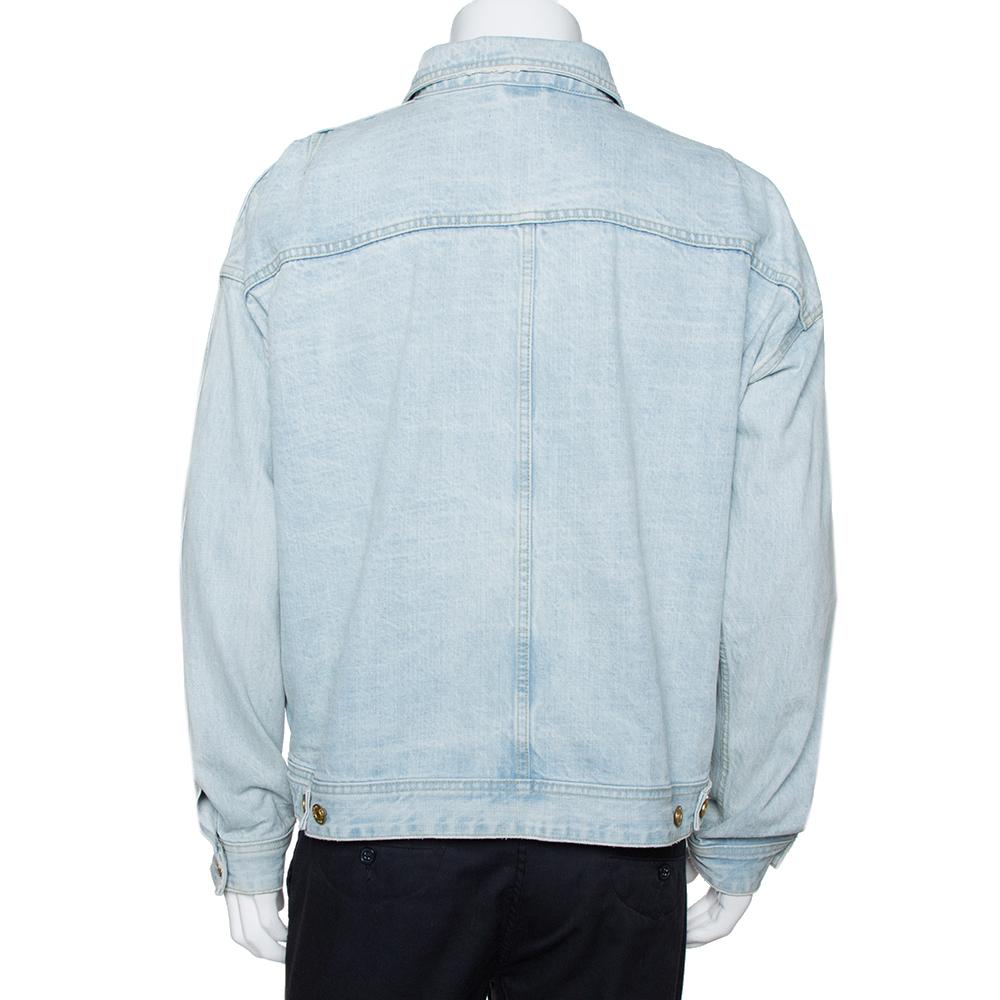 This jacket from Fear Of God's Fifth collection looks stylish when paired with cool bottoms. Get ready to win compliments for your style in this light blue denim Trucker jacket. It is cut from cotton and styled with a simple collar, button front,