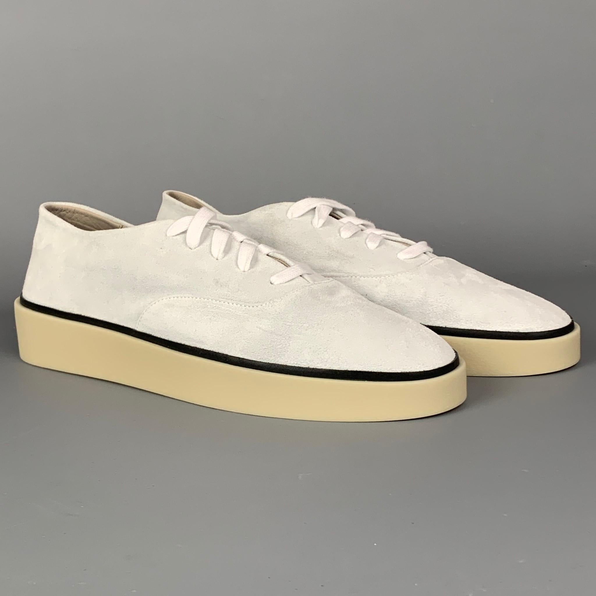 FEAR OF GOD for ERMENEGILDO ZEGNA sneakers comes in a off white suede with a black trim featuring a rubber sole and a lace up closure. Made in Italy.  Retail $595

Excellent Pre-Owned Condition.
Marked: A4794L 10EU 11US

Outsole: 
11.5 in. x 4 in.