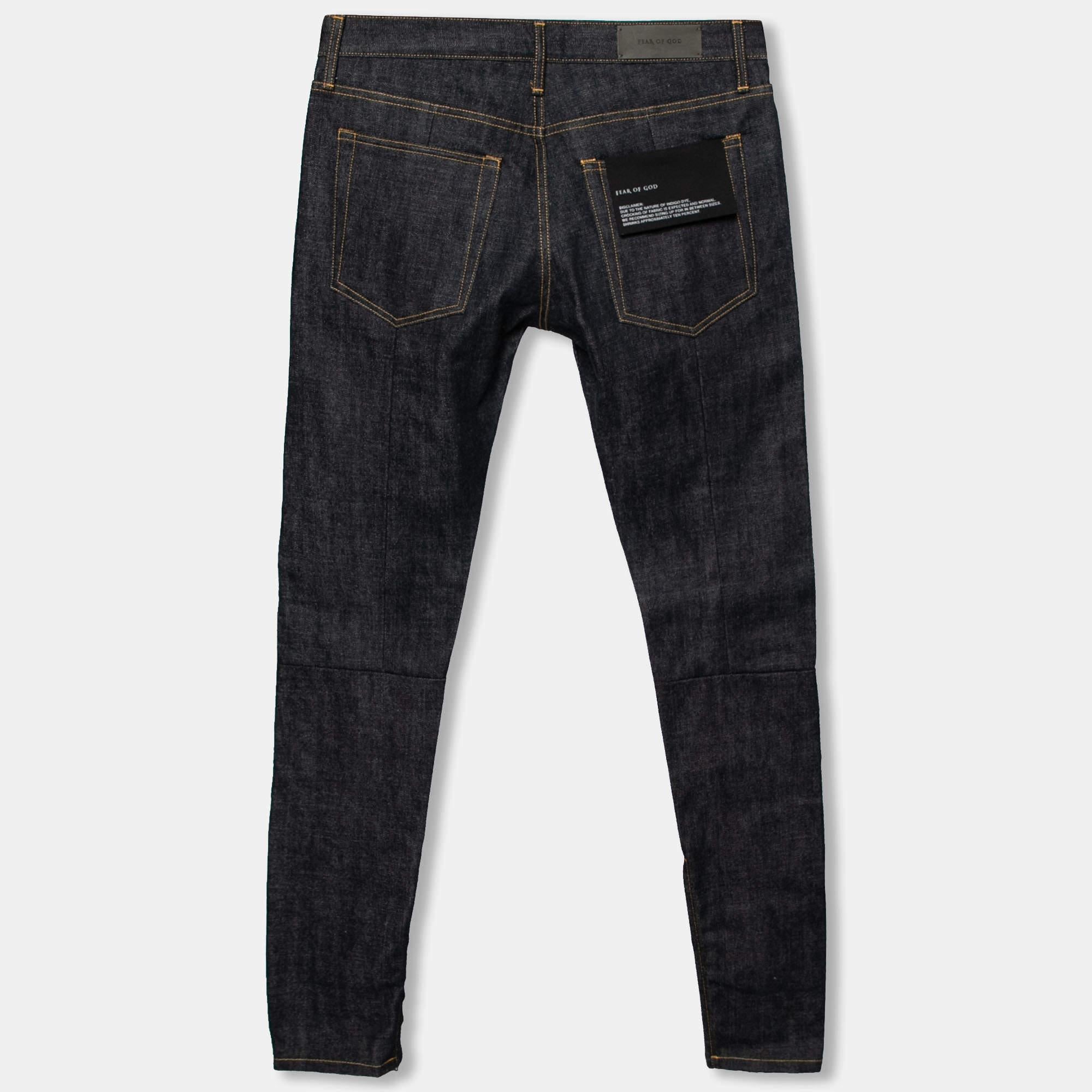 Fear of God brings you these super-cool and comfortable jeans for regular wear. This pair of jeans is made from navy blue cotton in a slim-fit style and is detailed with pockets and zipped hems.

Includes: Brand tag