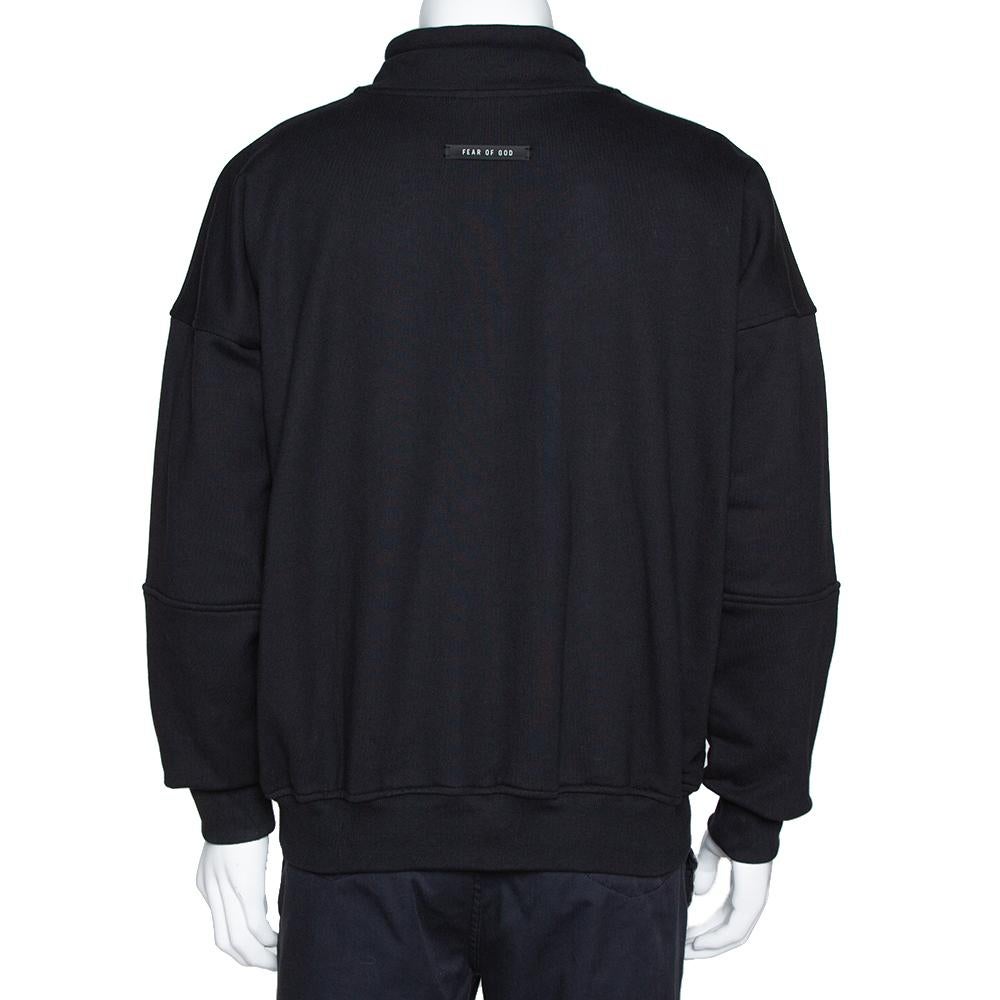 This black sweatshirt from Fear of God Sixth Collection comes with a contrasting white logo print to light up your casual style. It is made from cotton and designed with long sleeves. The comfortable creation will pair well with a variety of