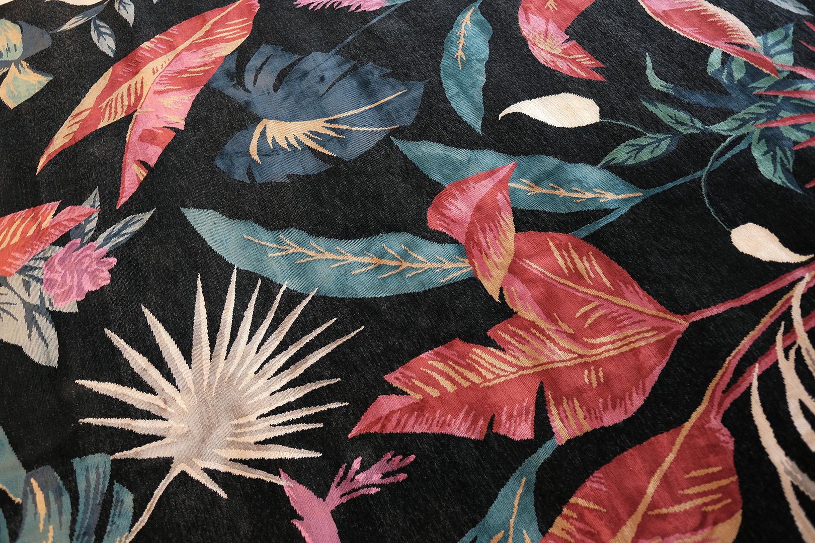 Over a year in design, “Fearful Symmetry” is a particularly Southern California expression. Liesel painted more than a dozen American botanicals. One seems to be peering through the blades of palm fronds and over broad leaves and ginger stems.