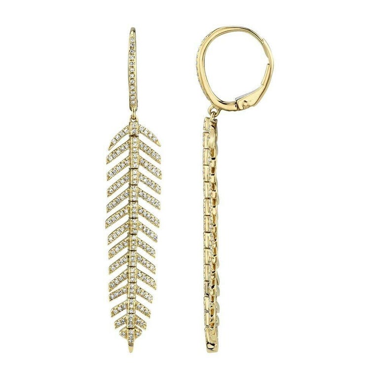 Diamond (0.6 total carat weight) feather shape flexible drop earrings in 14k yellow gold. The earrings are designed and handmade locally in Los Angeles by Sage Designs L.A. using earth-mined and conflict free diamonds. The earrings are 2.15