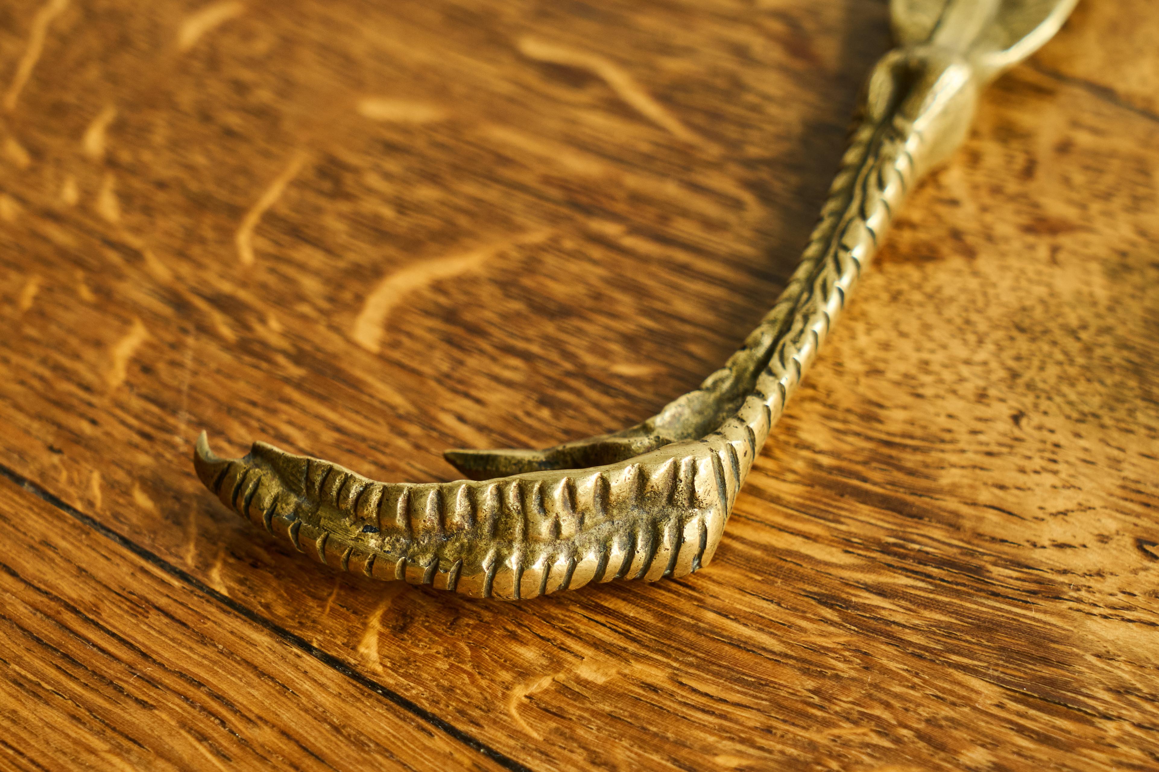 Feather and Claw Shaped Letter Opener in Patinated Sand Cast Brass 1960s In Good Condition For Sale In Meer, VAN