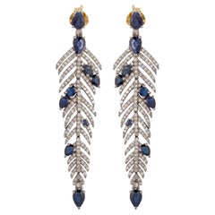 Boucles d'oreilles en goutte en forme de plumes avec saphir bleu et diamant