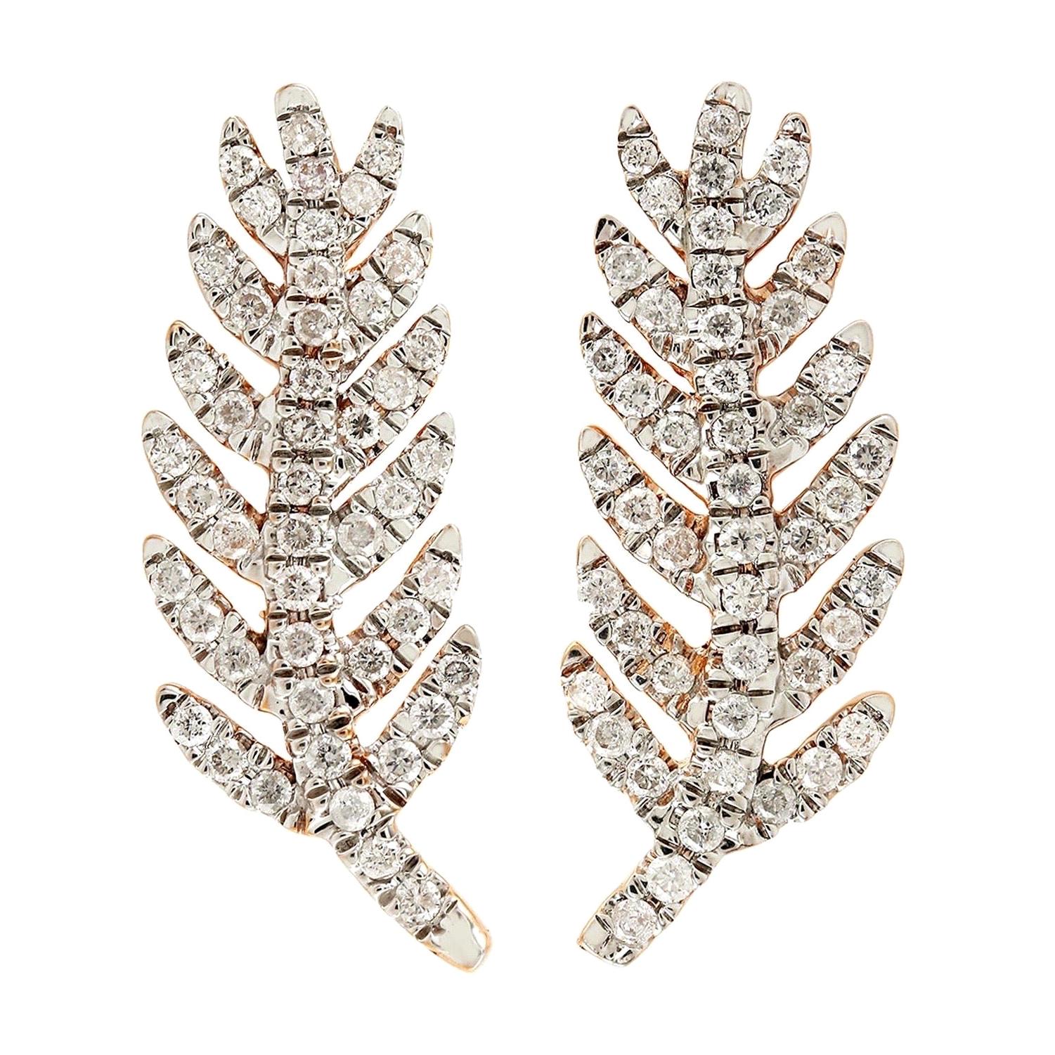Boucles d'oreilles manchette en forme de plumes en or 18 carats et diamants